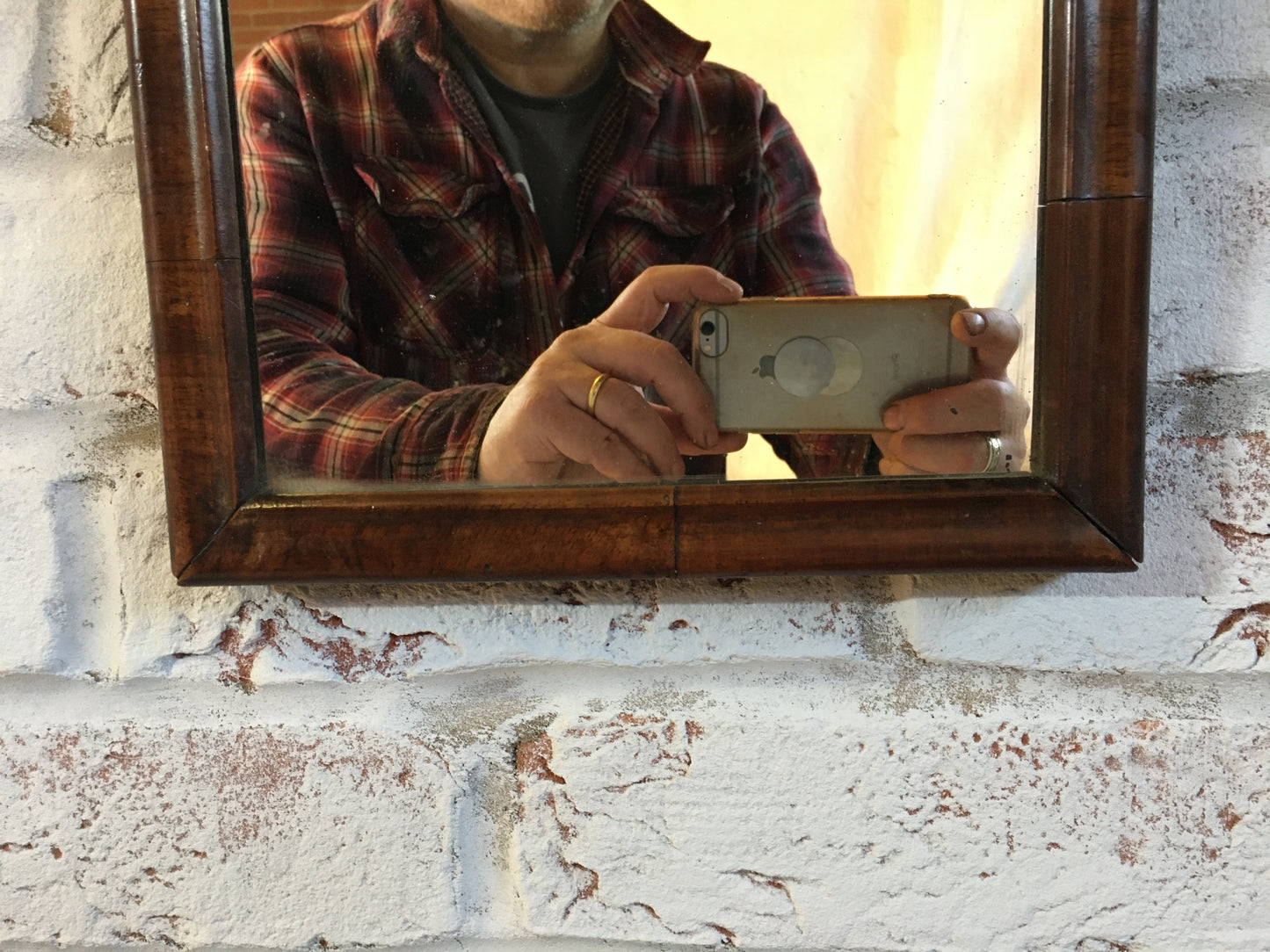Small Georgian walnut fret cut wall mirror.
