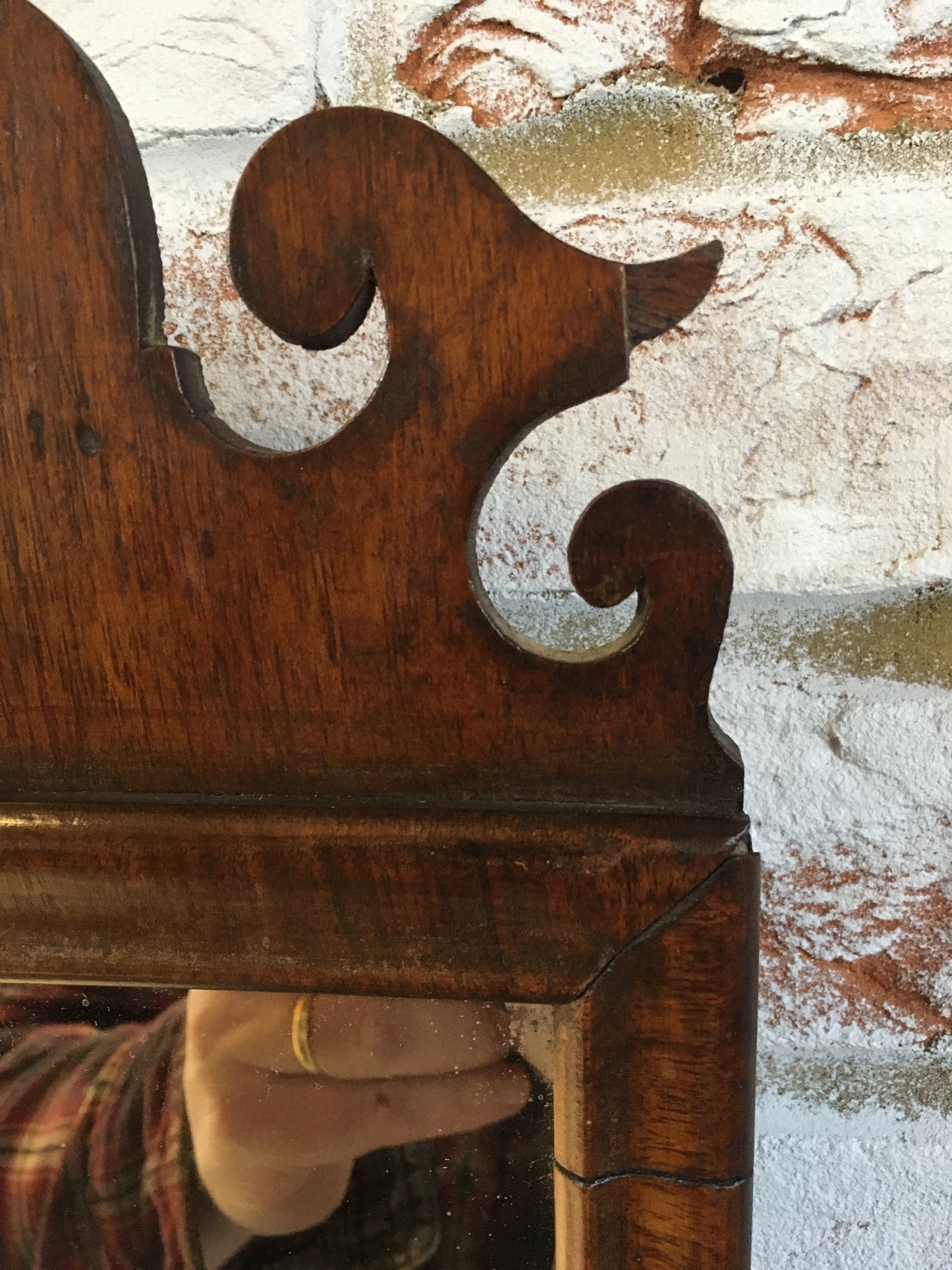 Small Georgian walnut fret cut wall mirror.