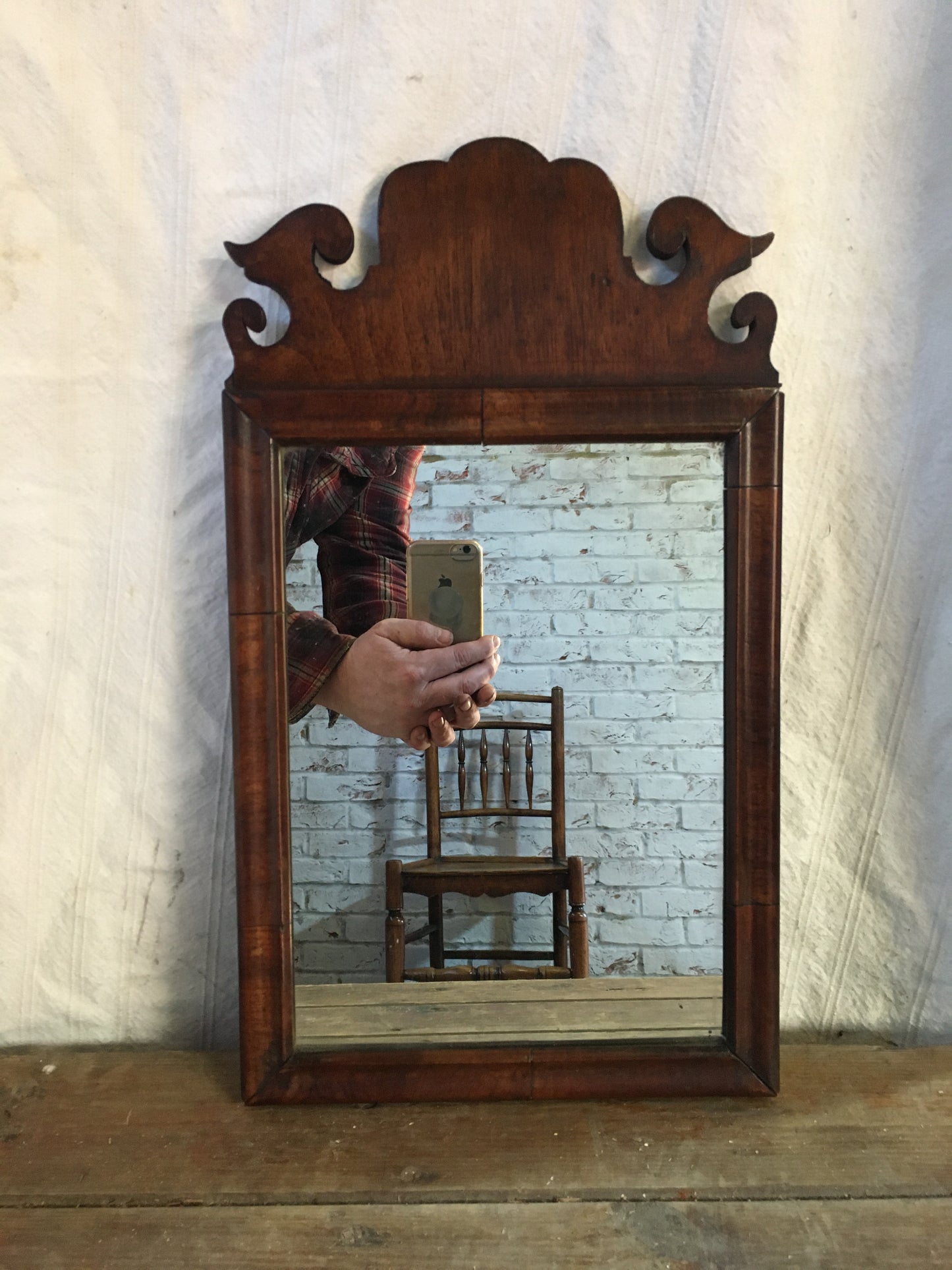 Small Georgian walnut fret cut wall mirror.