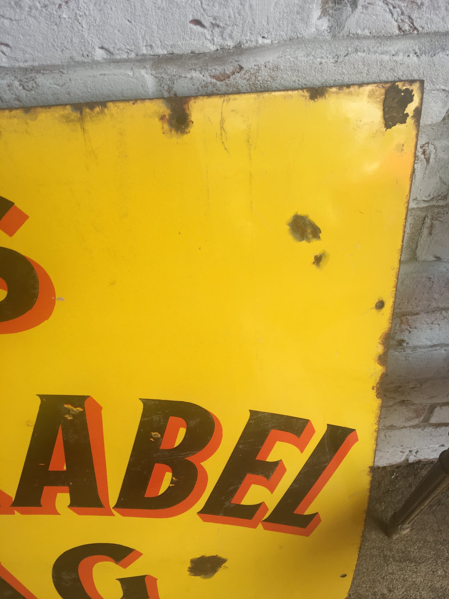 Large vintage enamel sign for "Bigg's Yellow Label Shag".