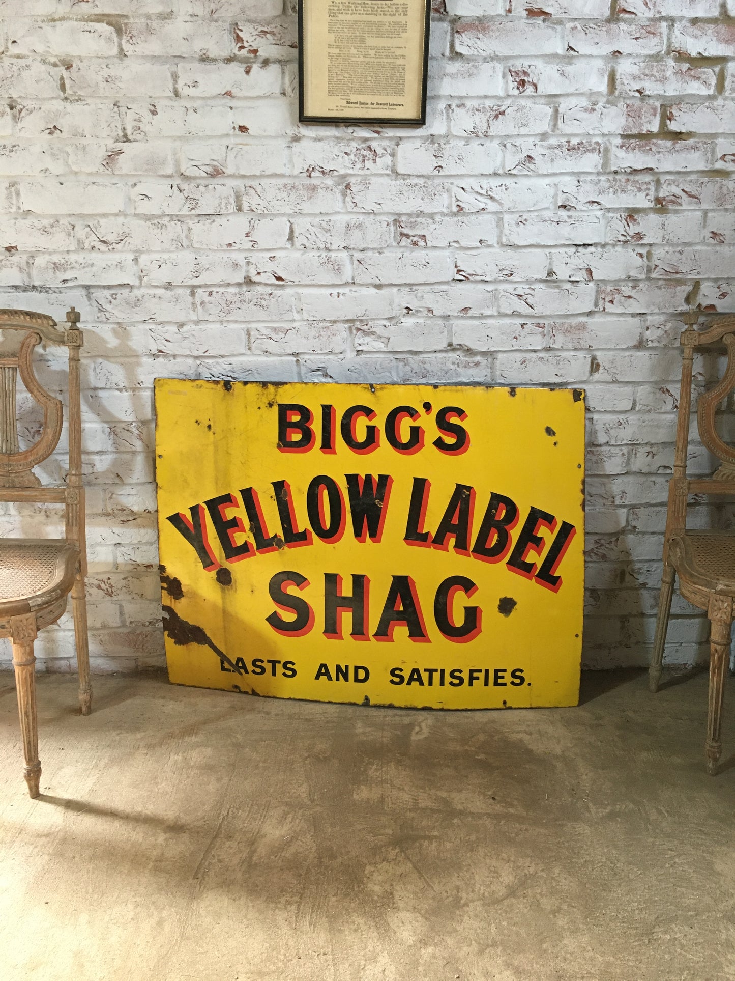 Large vintage enamel sign for "Bigg's Yellow Label Shag".