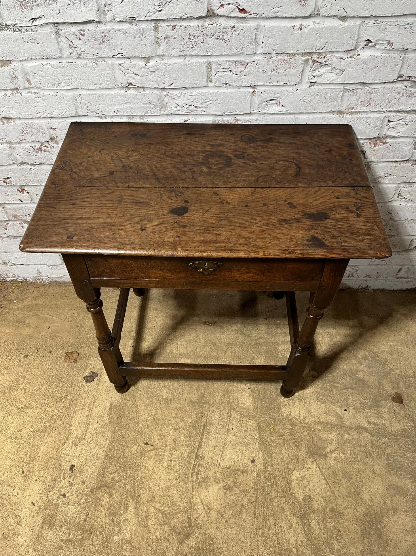 Early 18th century oak side table.