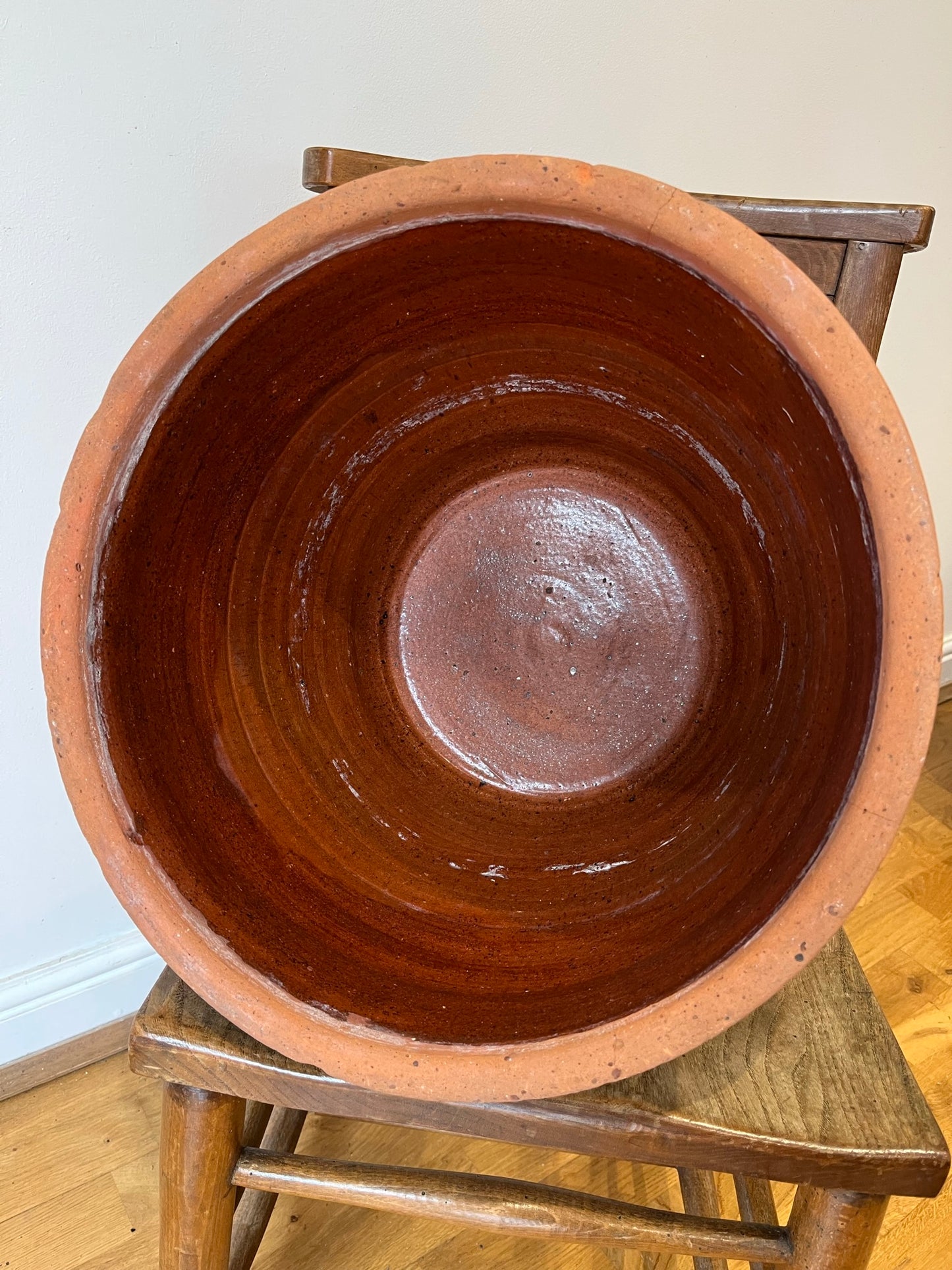 Large terracotta slip ware dairy bowl (or proofing bowl or pancheon bowl), with provenance.