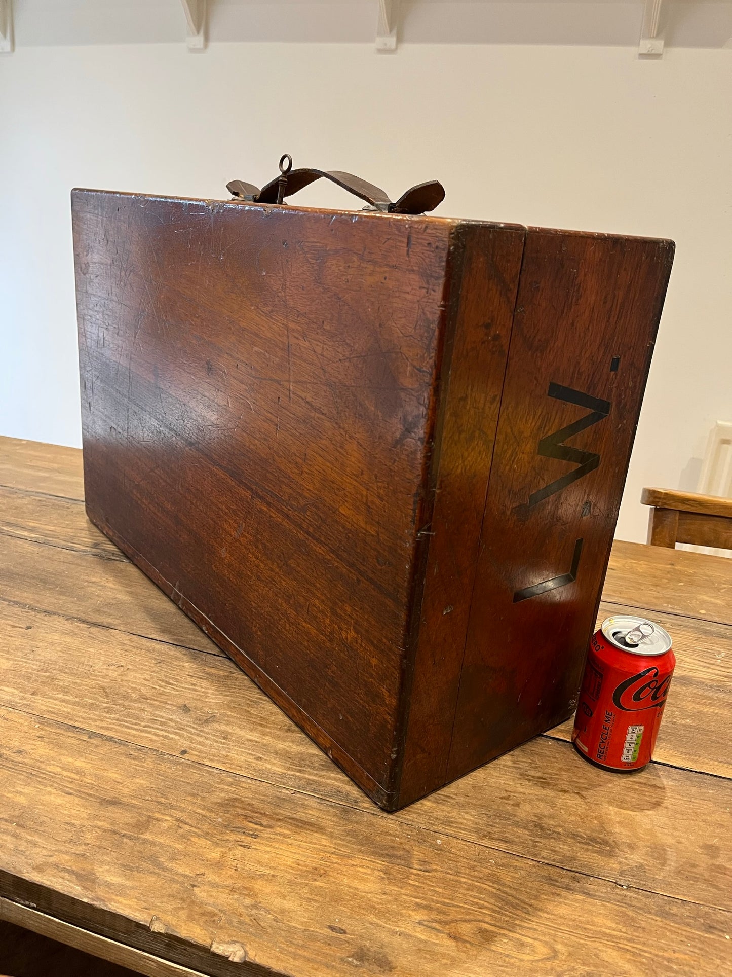 Intriguing early 20th century walnut case with key and Spanish tickets/leaflets lining.