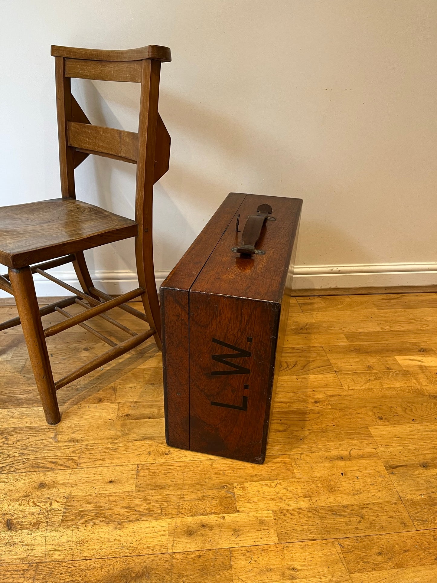 Intriguing early 20th century walnut case with key and Spanish tickets/leaflets lining.