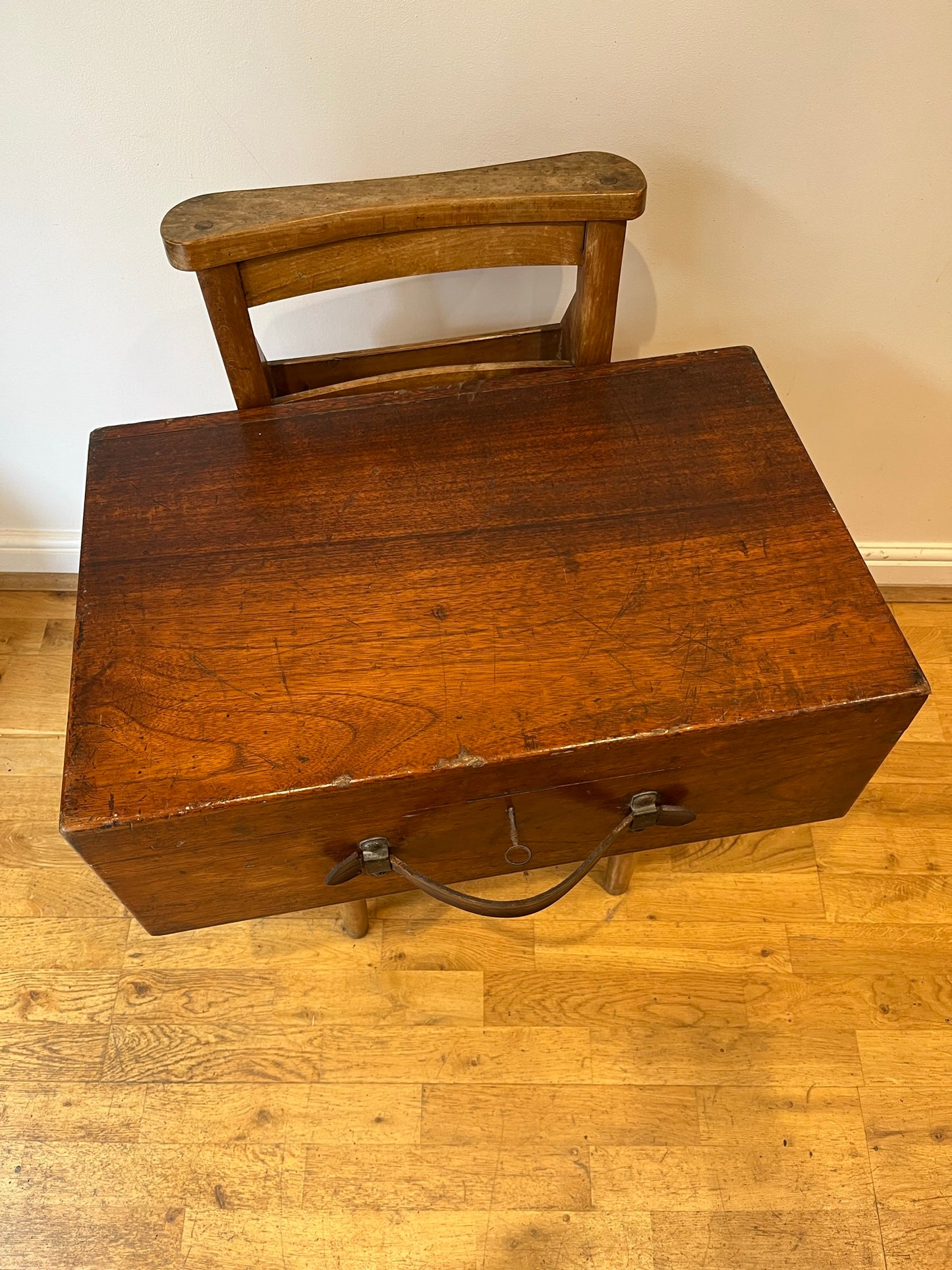 Intriguing early 20th century walnut case with key and Spanish tickets/leaflets lining.