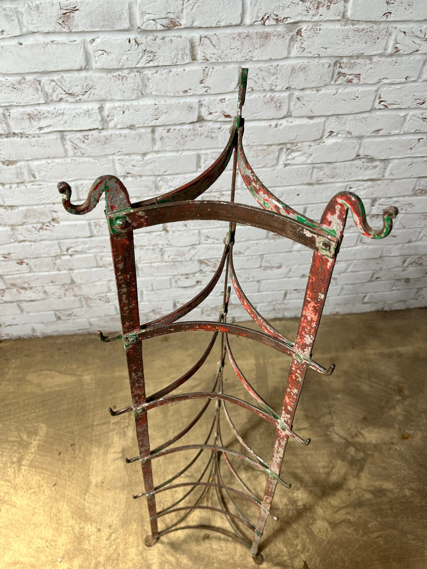 Large kitchen pots and pans rack with hooks.