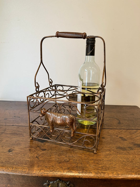 Pretty French milk bottle holder with cast cow detail.