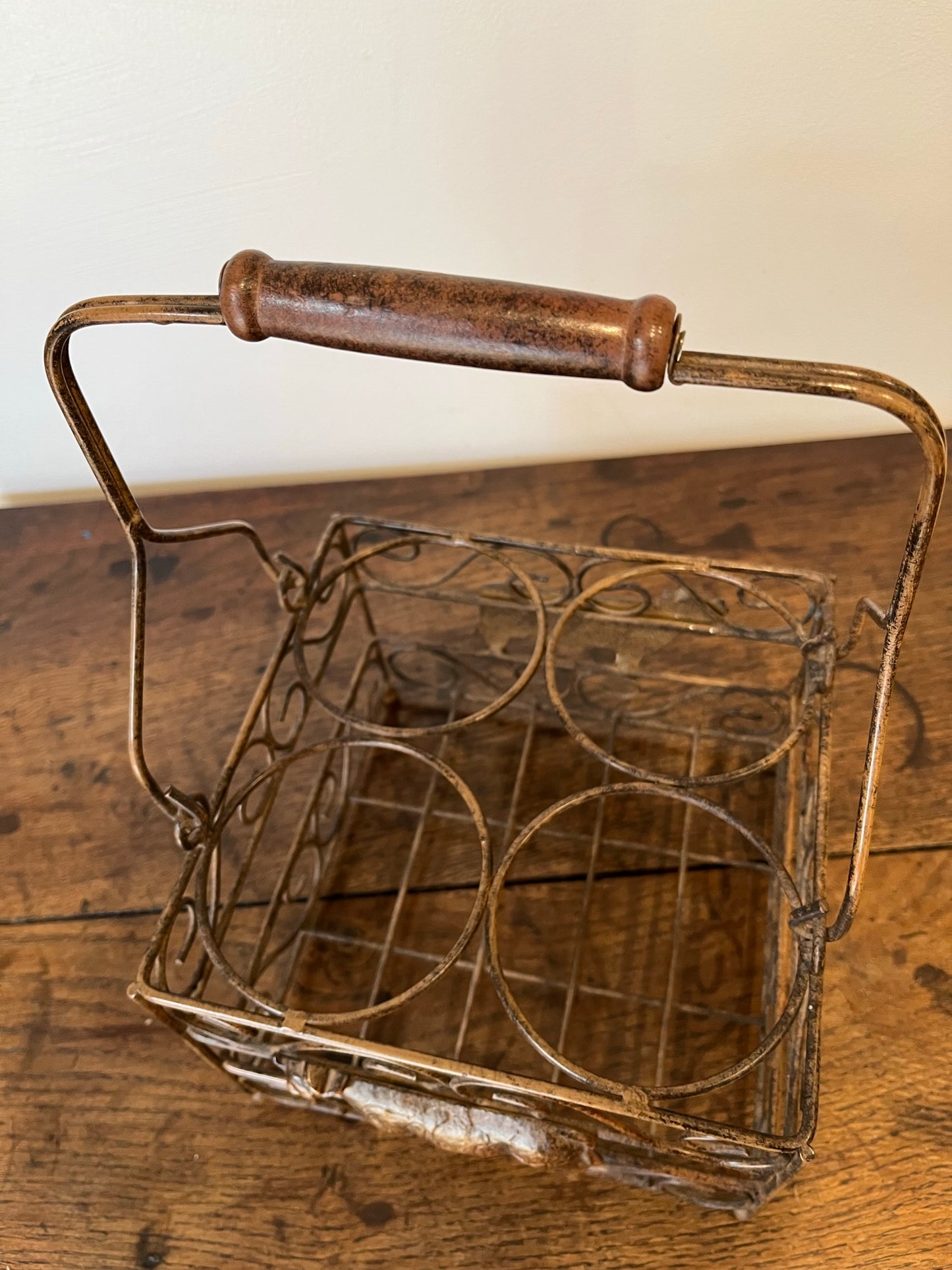 Pretty French milk bottle holder with cast cow detail.