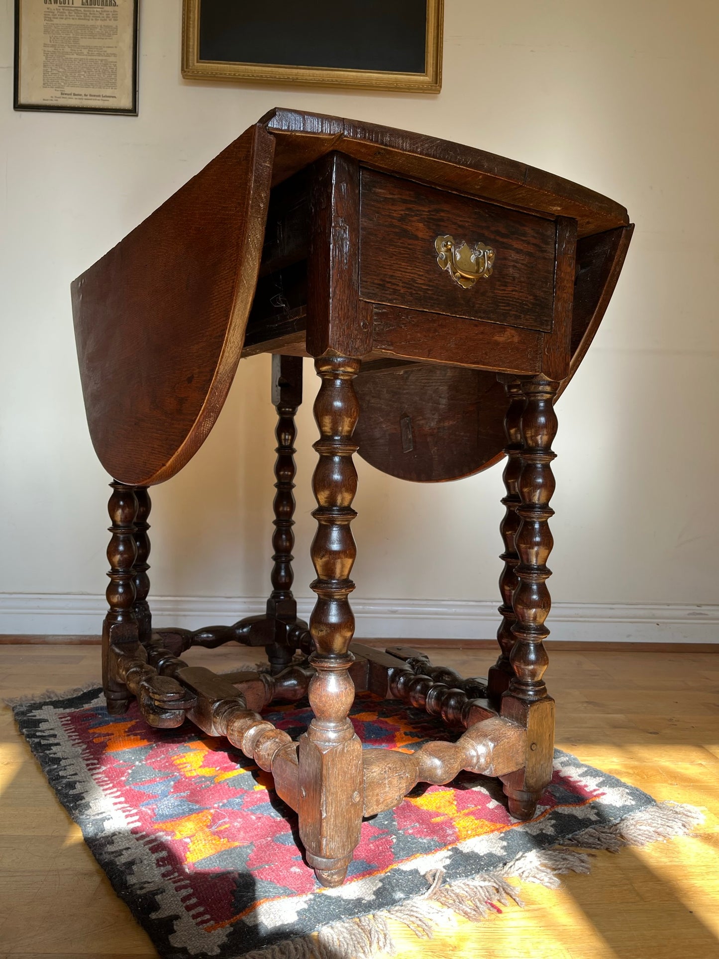 Interesting late 17th century / early 18th century oak drop-leaf table.