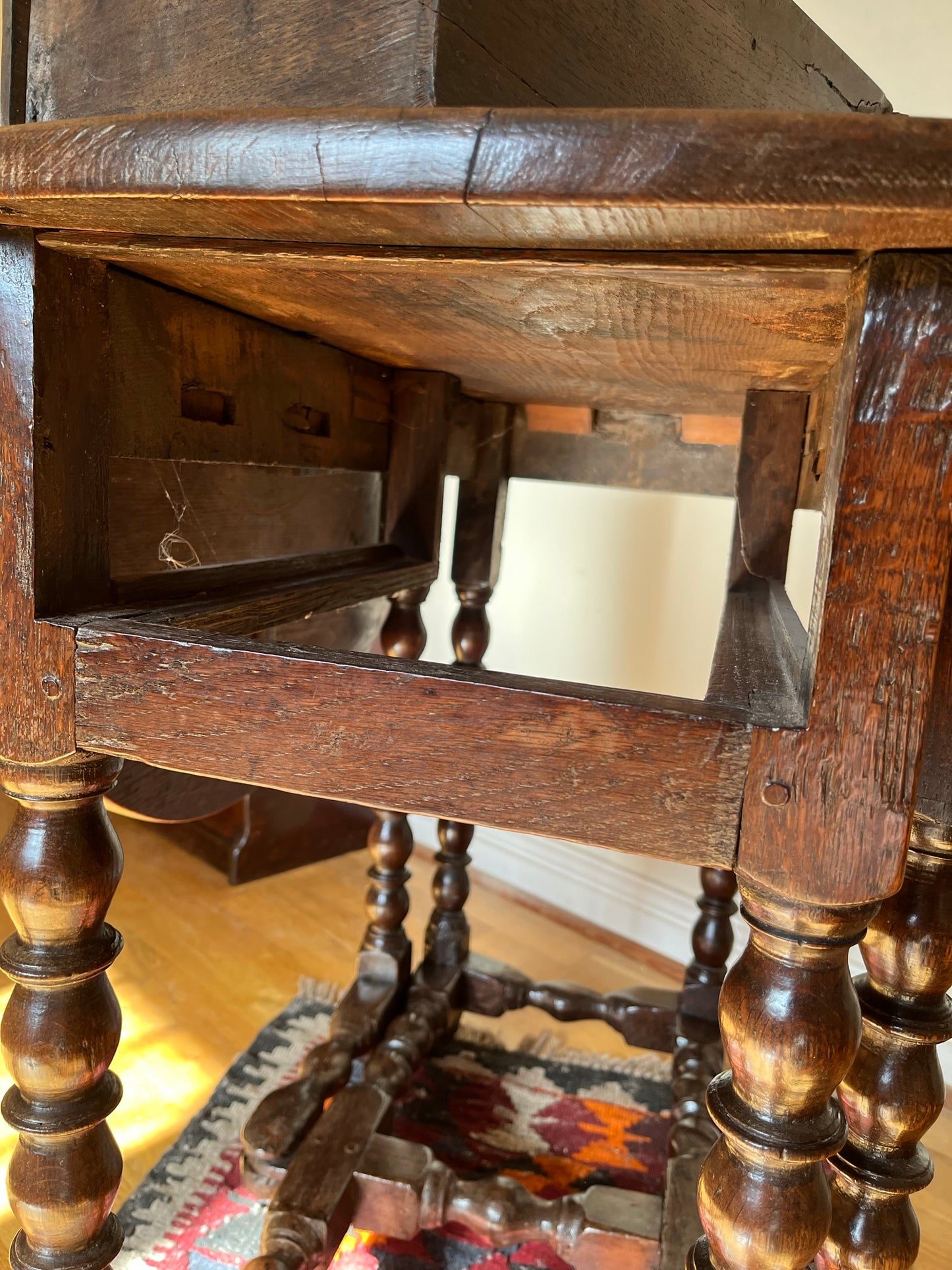 Interesting late 17th century / early 18th century oak drop-leaf table.