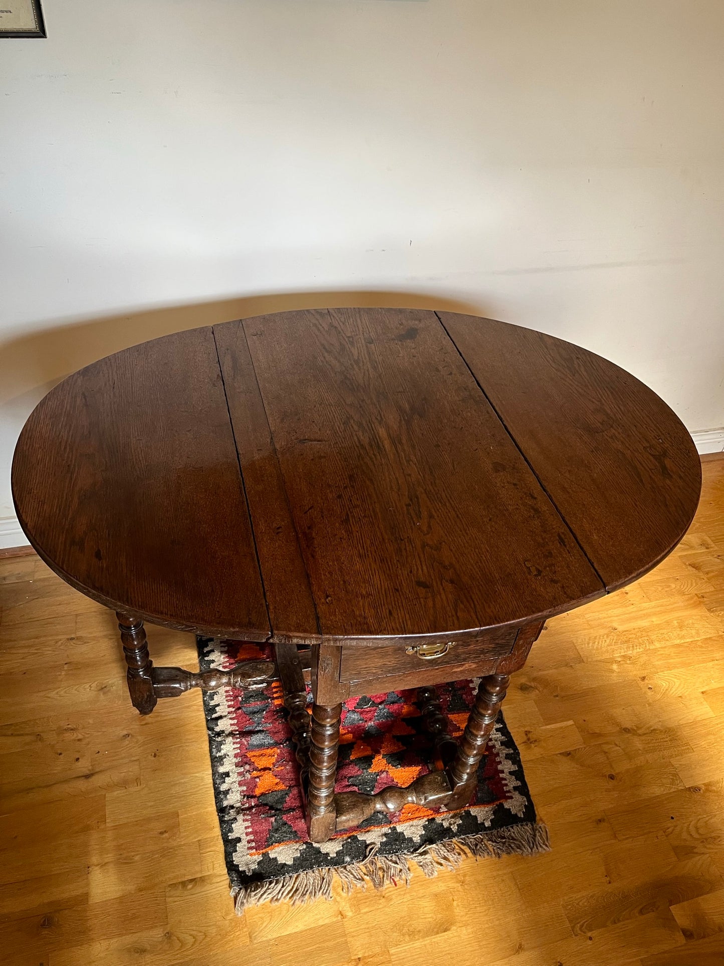 Interesting late 17th century / early 18th century oak drop-leaf table.