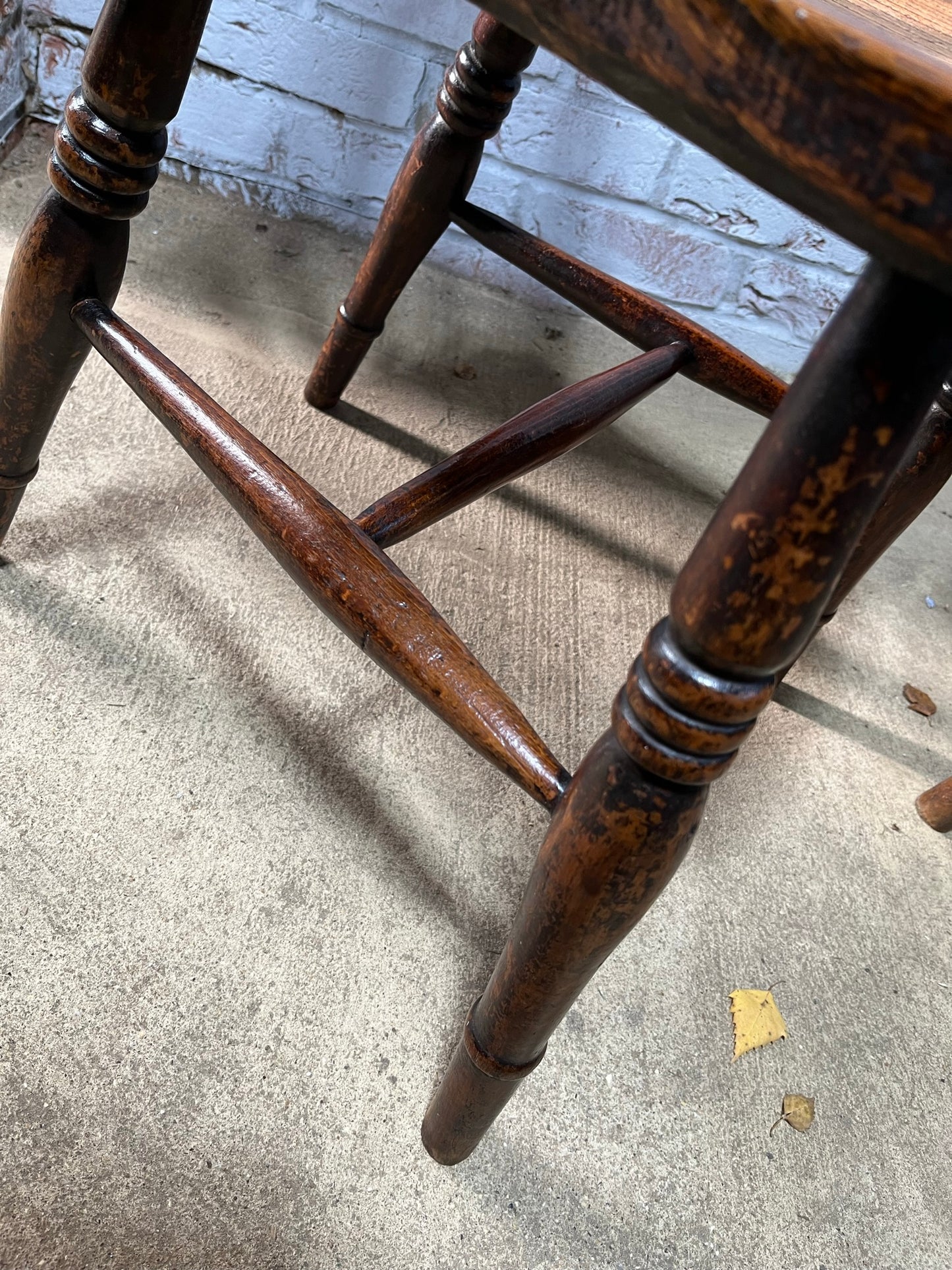 Near pair of Victorian elm slat back Windsor kitchen chairs.