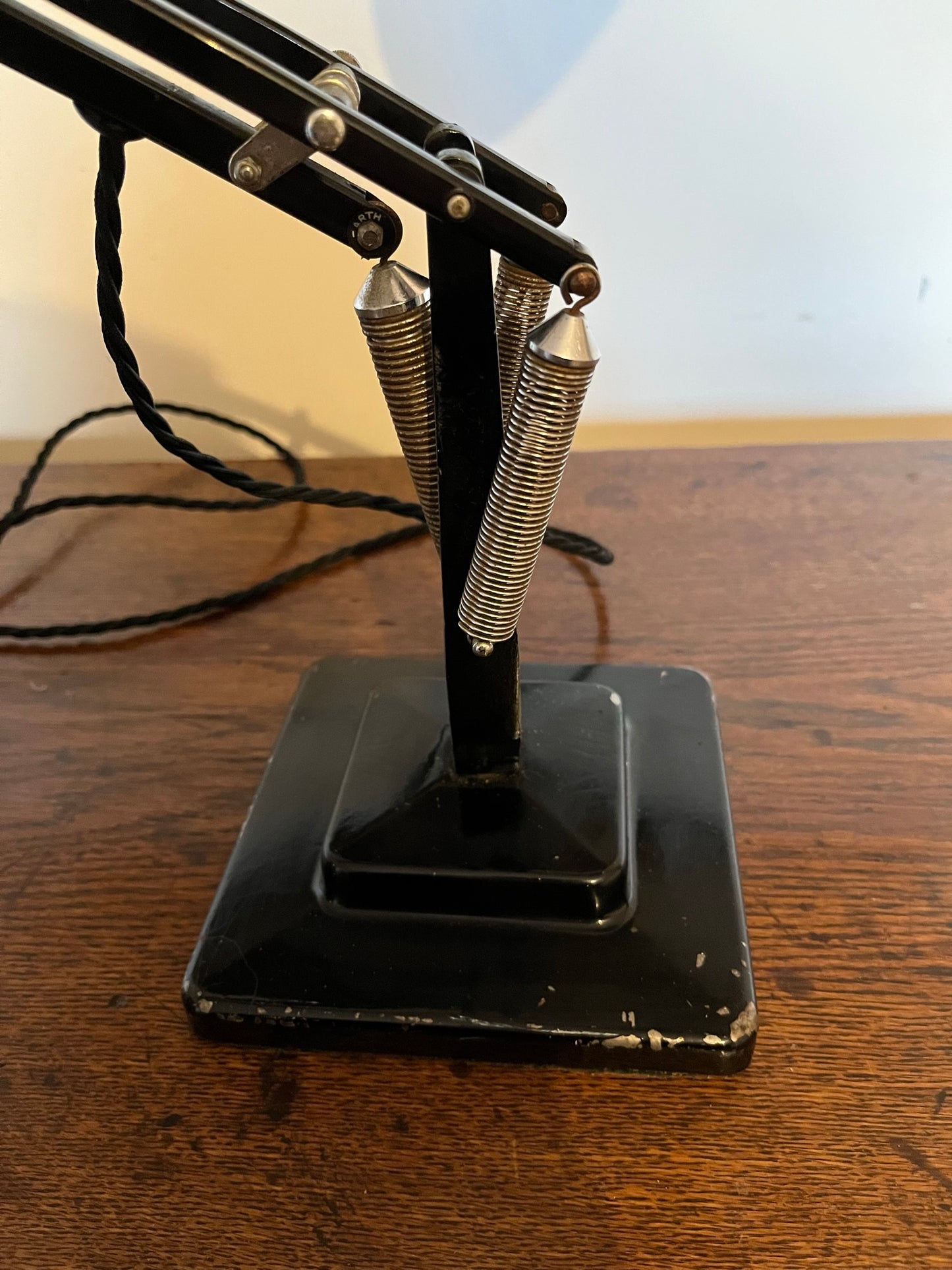 A matching pair of black Anglepoise desk lamps by Herbert Terry and Sons, 1940s.