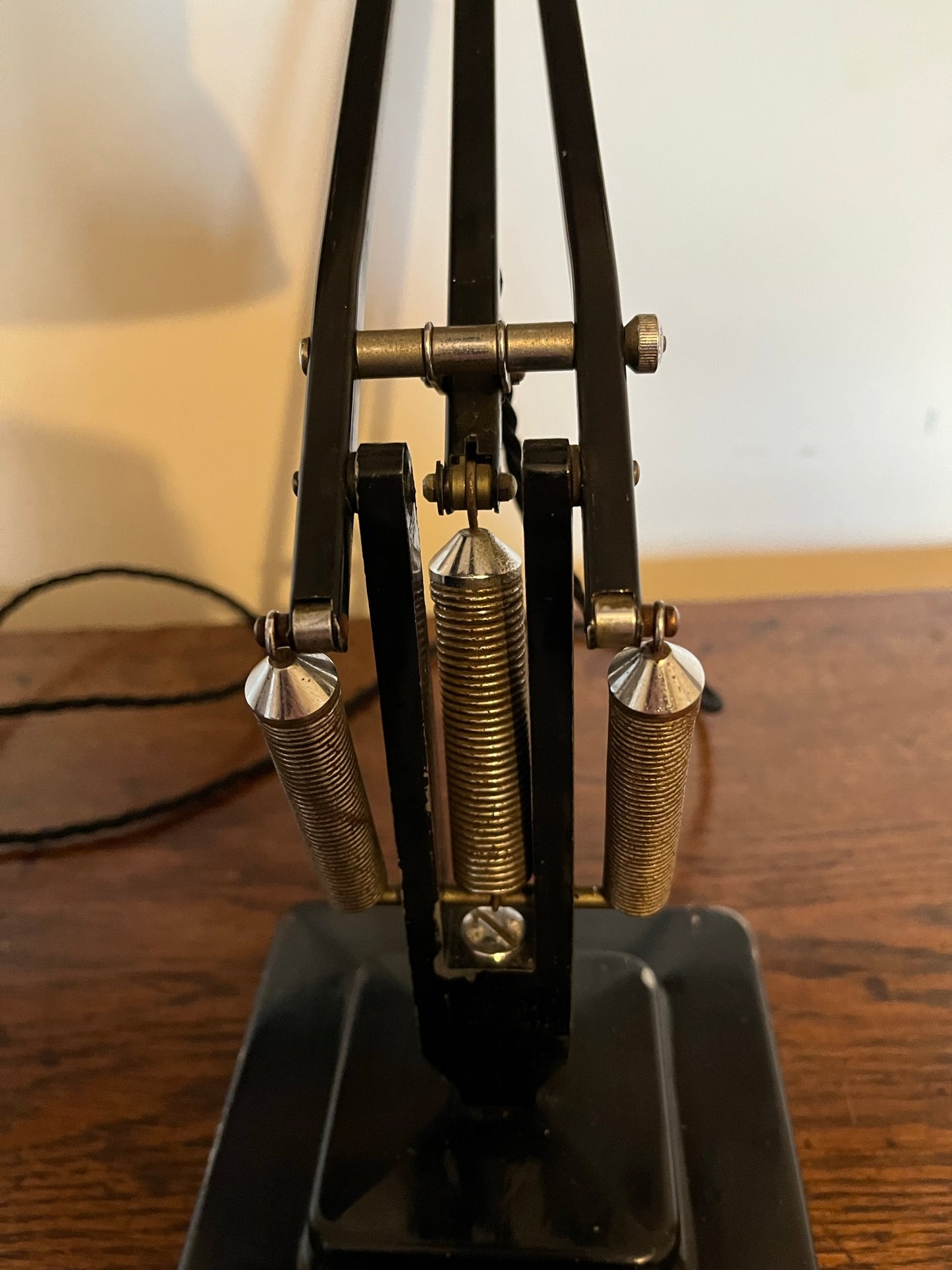 A matching pair of black Anglepoise desk lamps by Herbert Terry and Sons, 1940s.