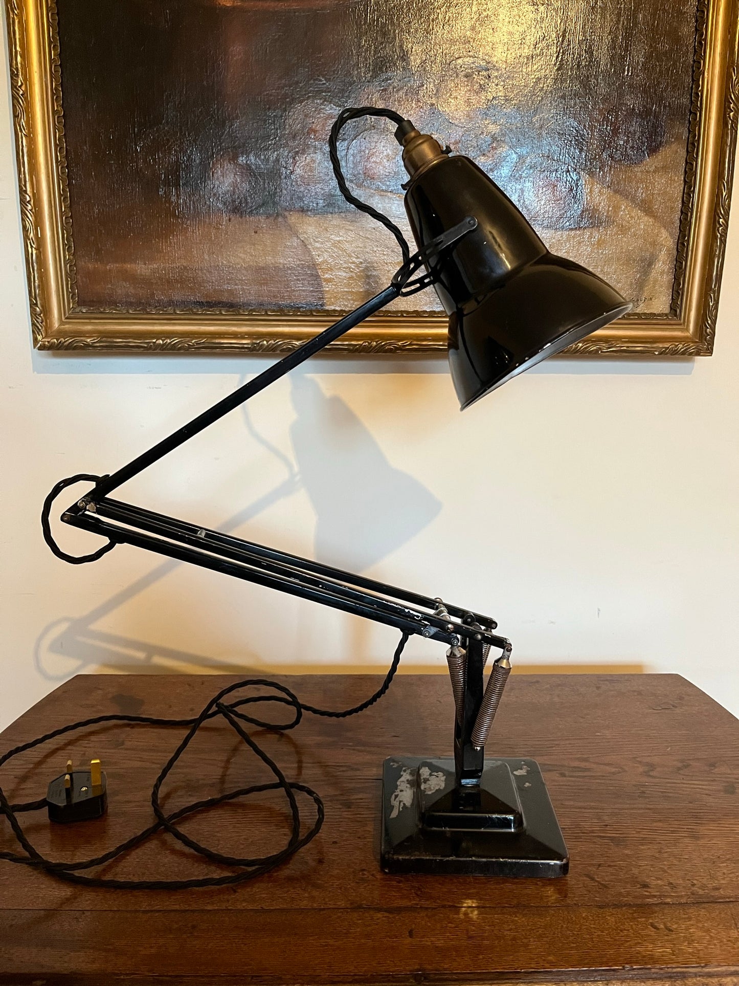 A matching pair of black Anglepoise desk lamps by Herbert Terry and Sons, 1940s.