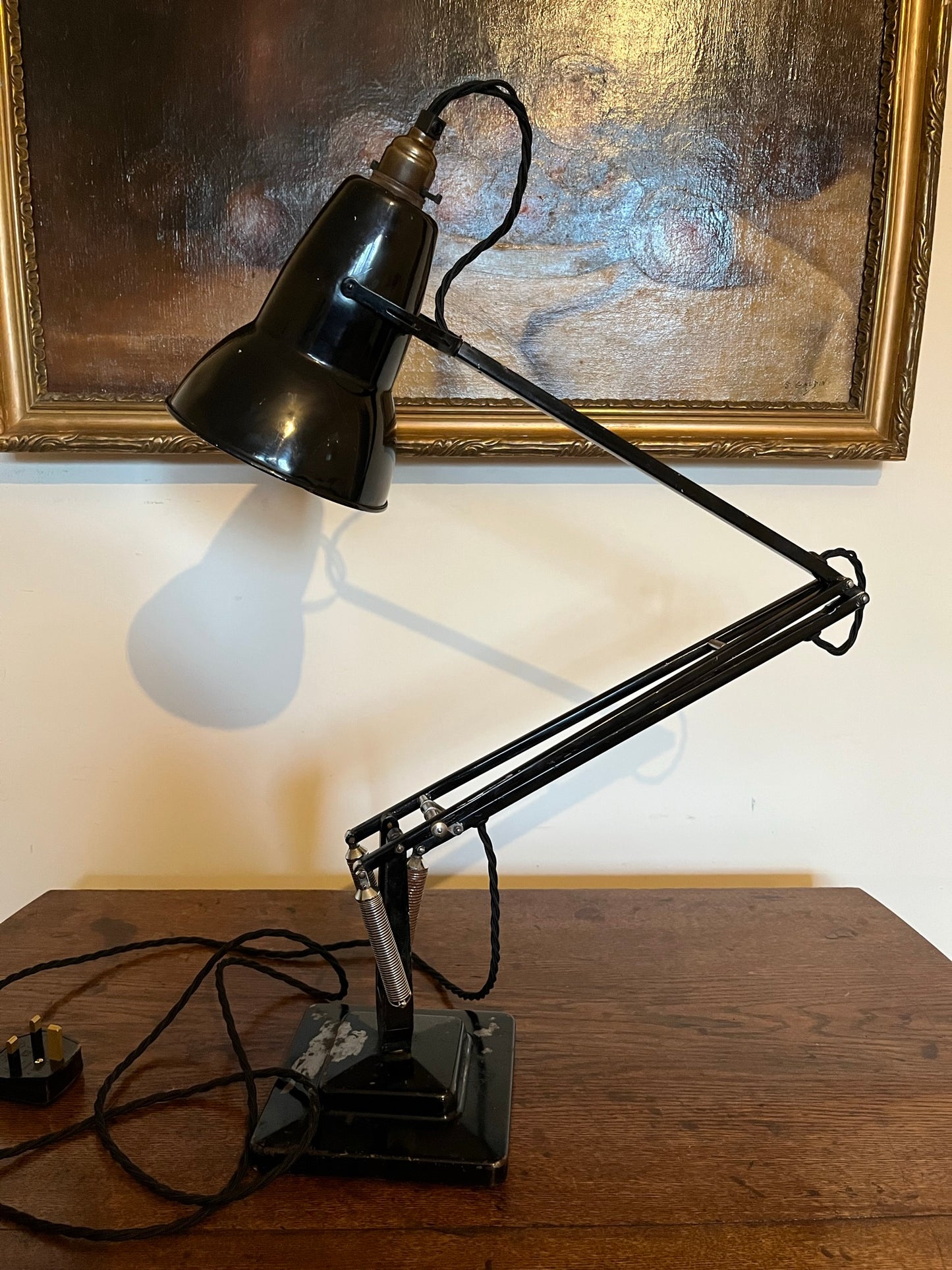 A matching pair of black Anglepoise desk lamps by Herbert Terry and Sons, 1940s.
