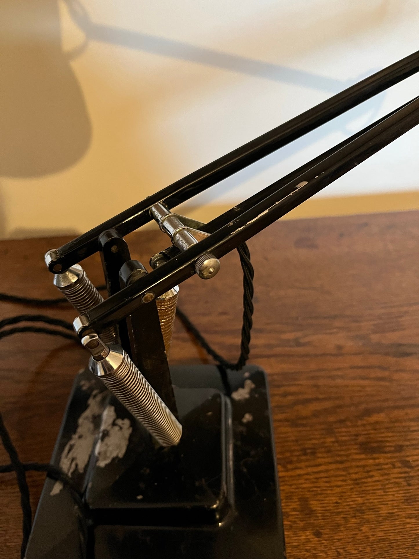 A matching pair of black Anglepoise desk lamps by Herbert Terry and Sons, 1940s.