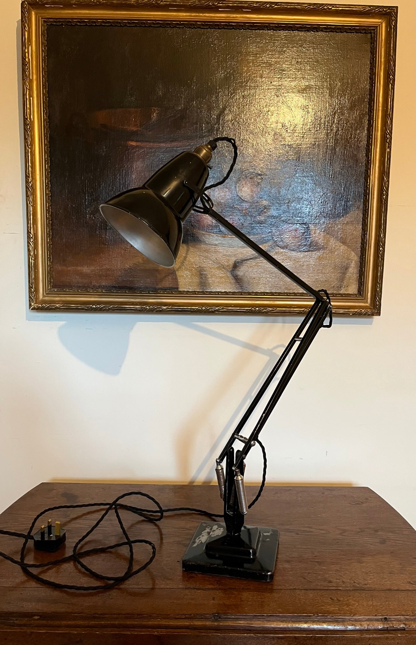 A matching pair of black Anglepoise desk lamps by Herbert Terry and Sons, 1940s.