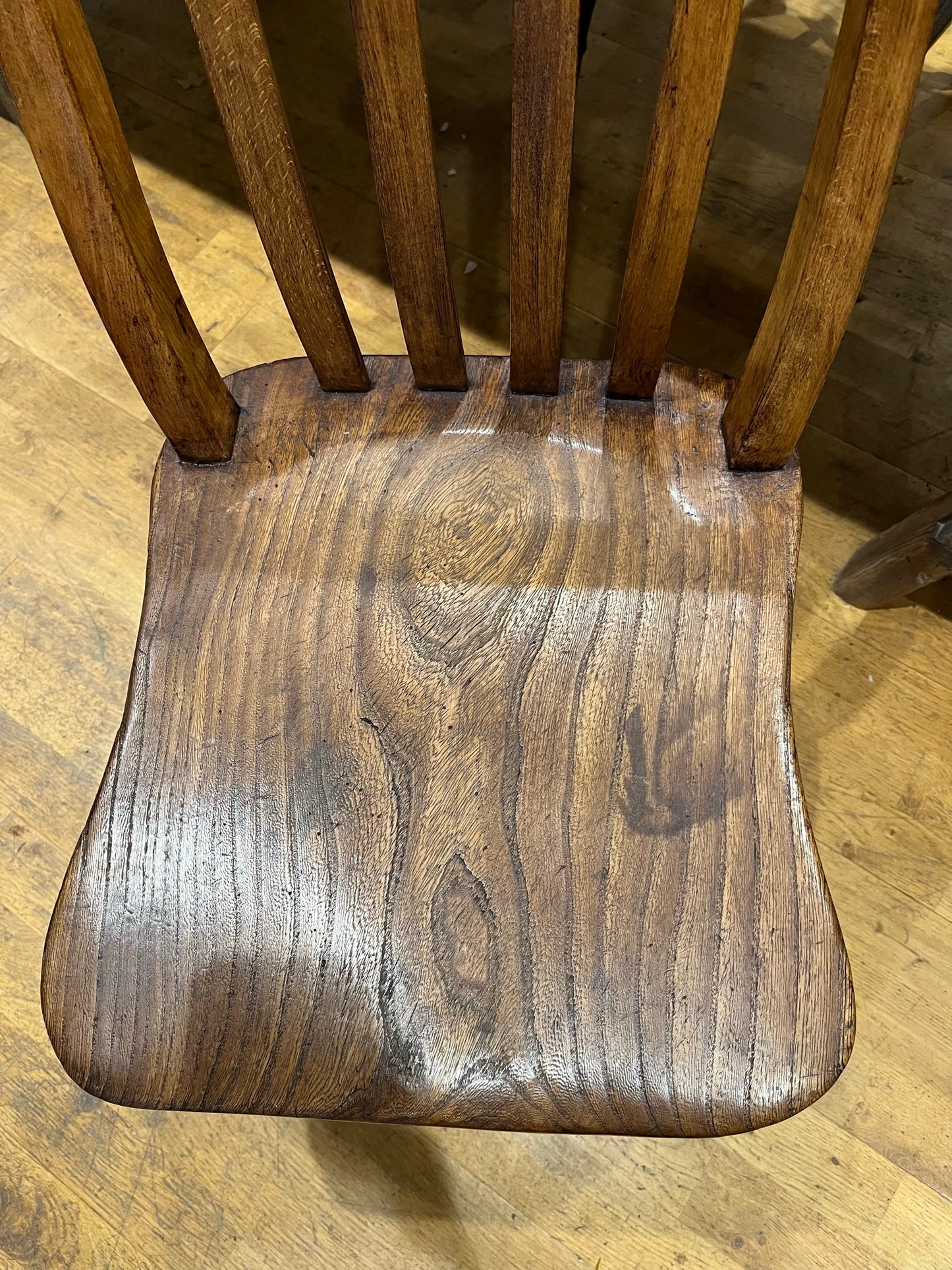 A good pair of Windsor slat back country kitchen chairs.