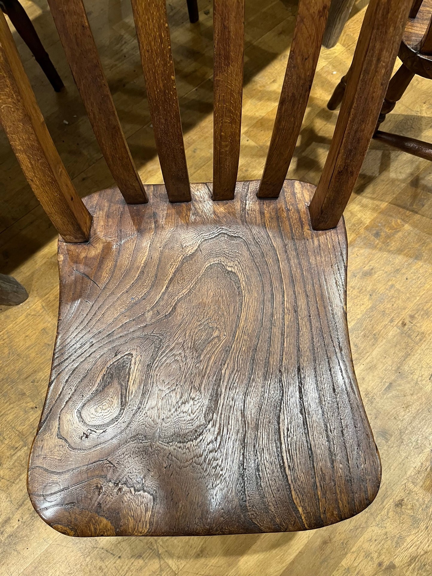 A good pair of Windsor slat back country kitchen chairs.