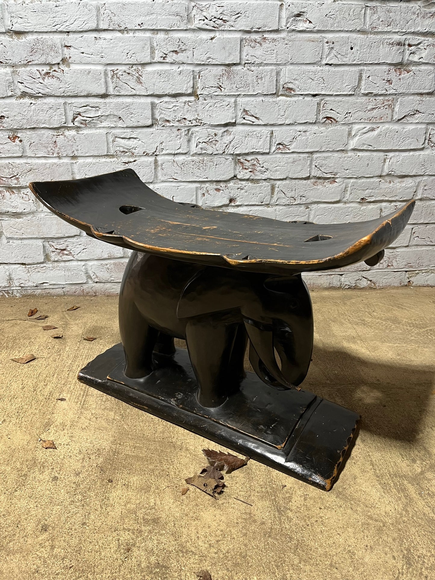 Ebonised African elephant Ashanti stool or coffee table.