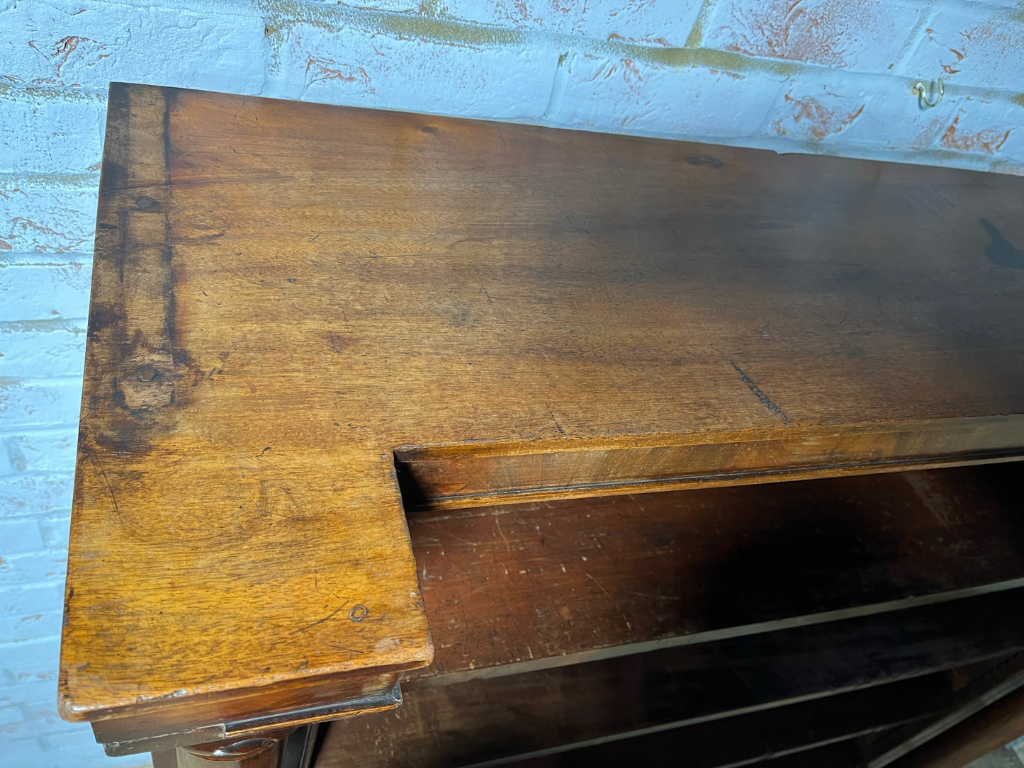A very large William IV/early Victorian mahogany open bookcase with drawers.