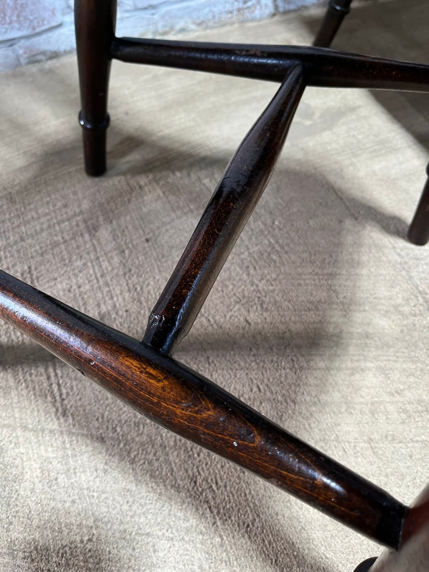 Matching pair of early 19th century kitchen Windsor chairs.