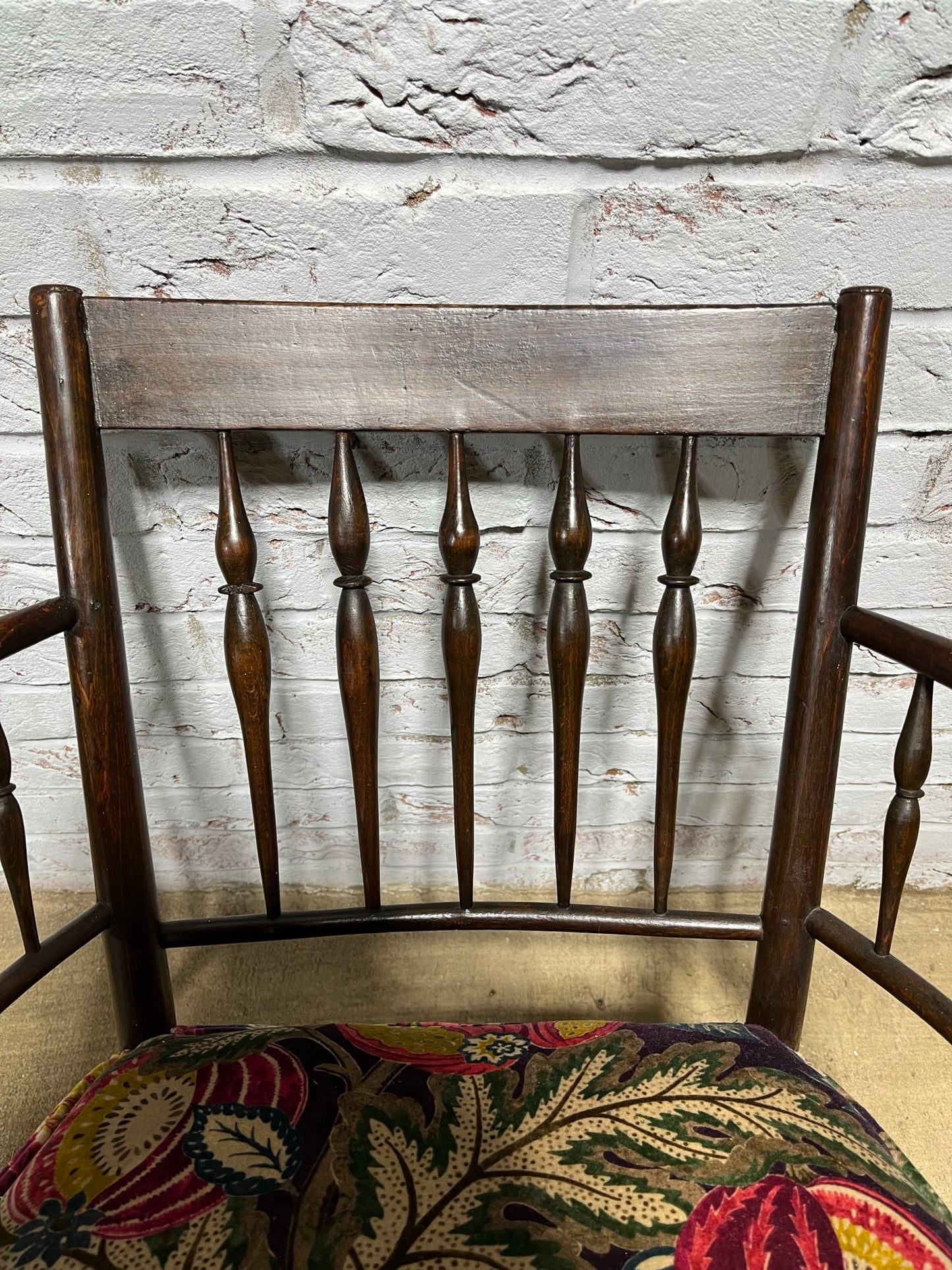 Upholstered Arts & Crafts ‘Sussex’ chair, late 19th/early 20th century, stamped.