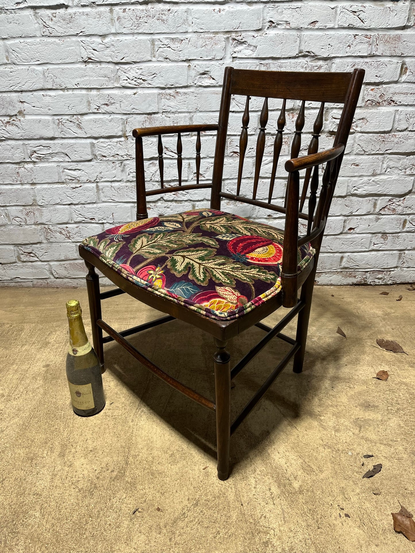 Upholstered Arts & Crafts ‘Sussex’ chair, late 19th/early 20th century, stamped.