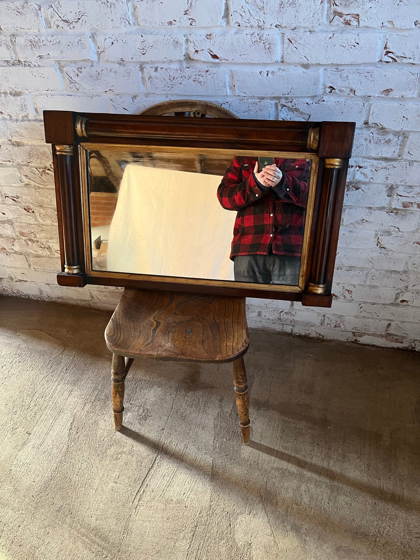 Regency rosewood and gilt overmantle or wall mirror.