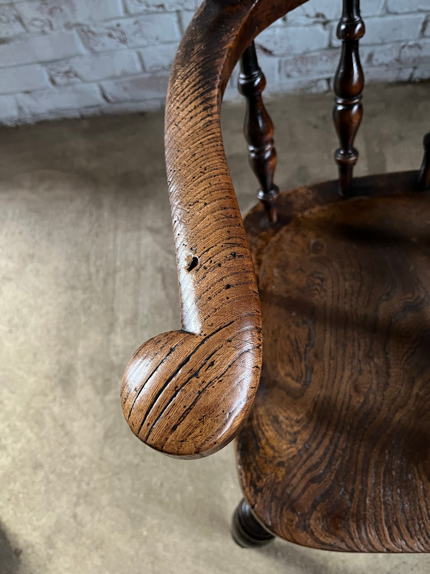 Early Victorian smokers bow arm fireside chair.