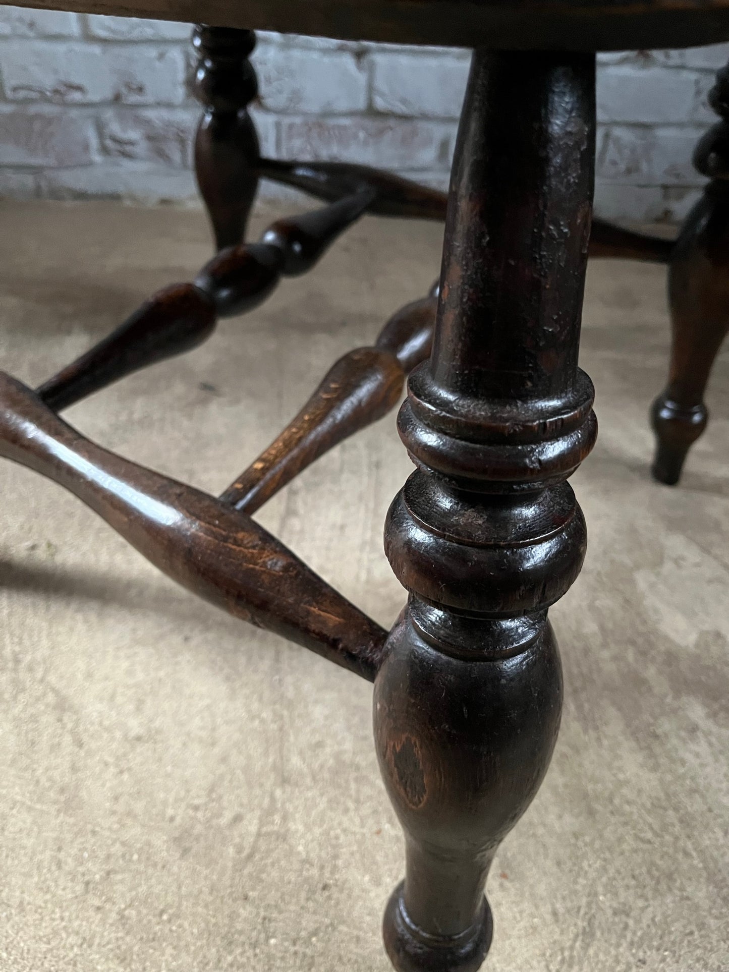 Early Victorian smokers bow arm fireside chair.