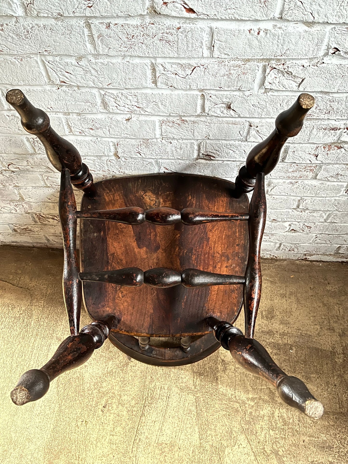 Early Victorian smokers bow arm fireside chair.