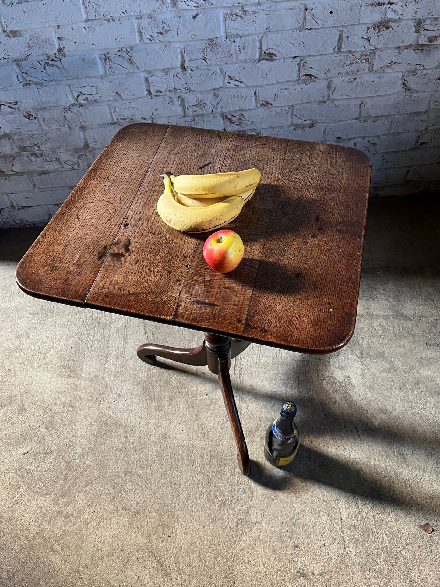 Early 19th century provincial tilt top wine or lamp table.