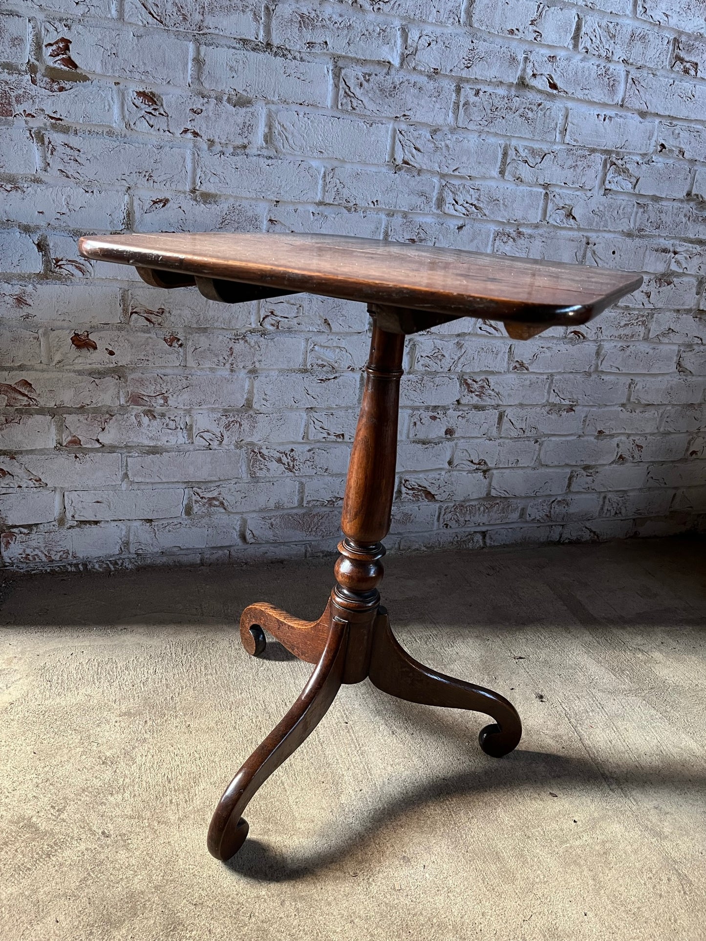 Early 19th century provincial tilt top wine or lamp table.