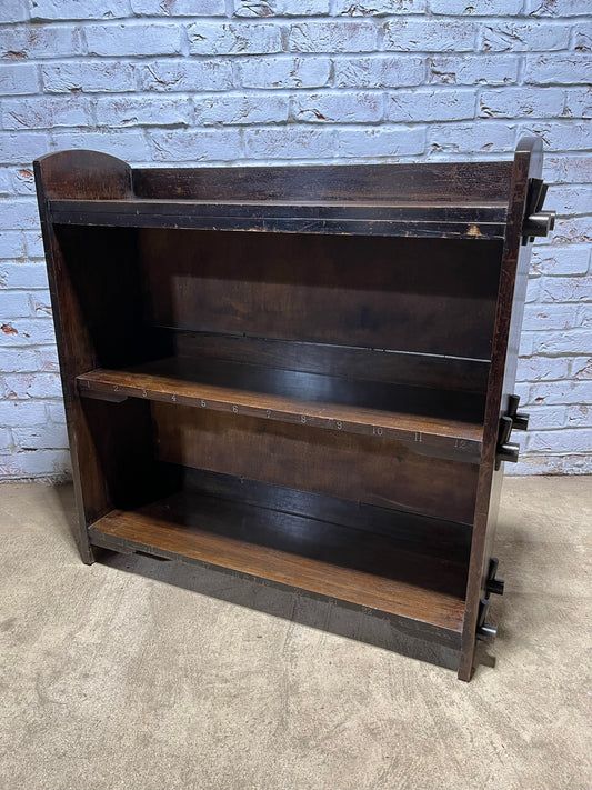 Arts and crafts oak freestanding open bookcase.