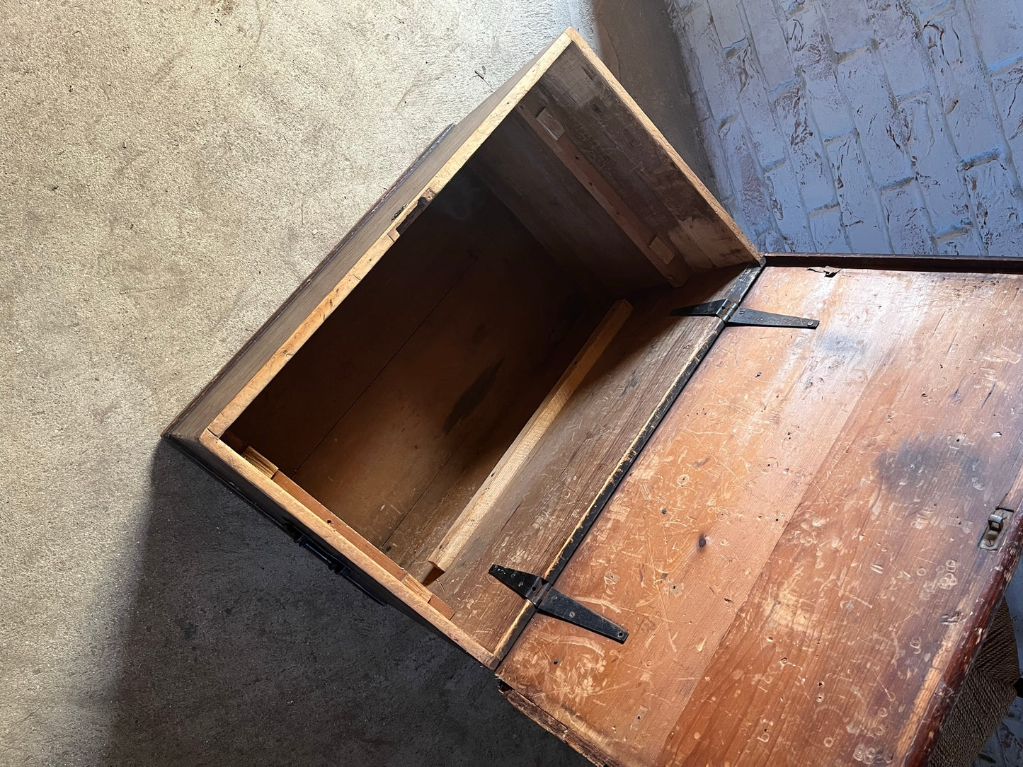 19th-century pine carpenter's chest or blanket box in original stain.