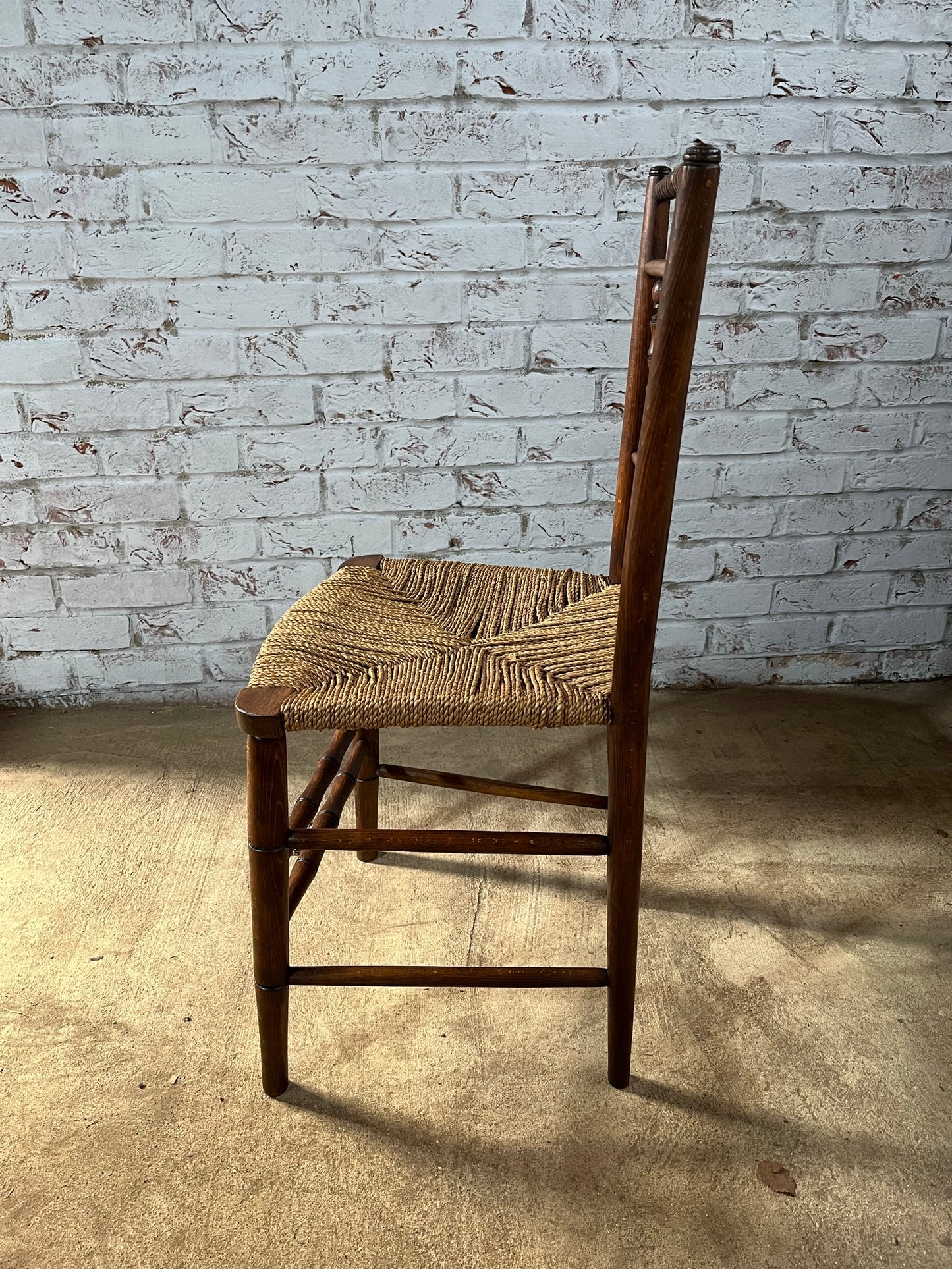 Antique spindle and bobbin back country side chair.
