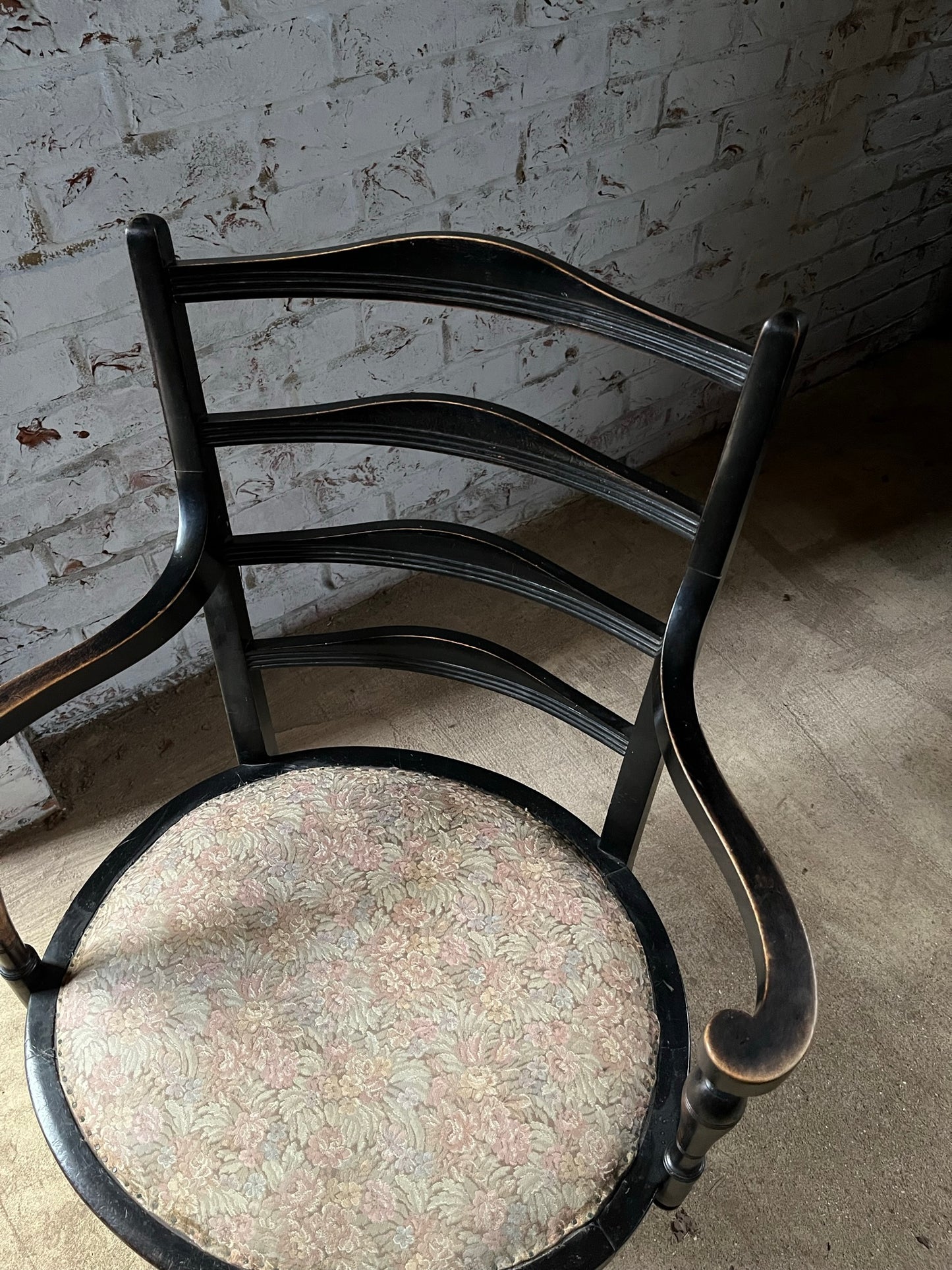 Aesthetic movement low ebonised chair.