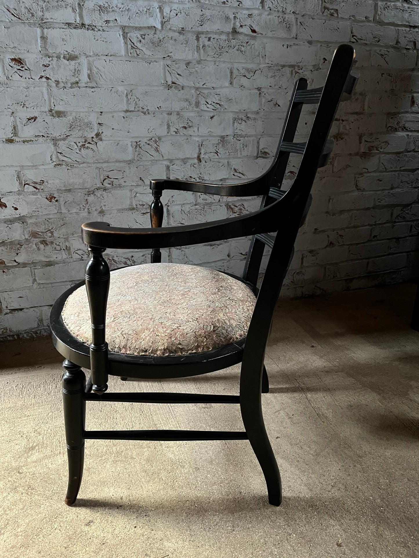Aesthetic movement low ebonised chair.