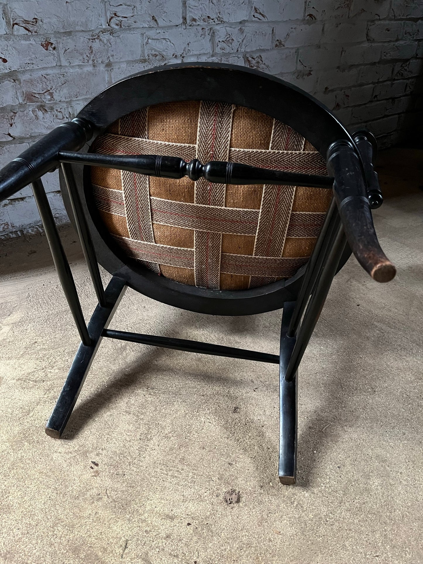 Aesthetic movement low ebonised chair.