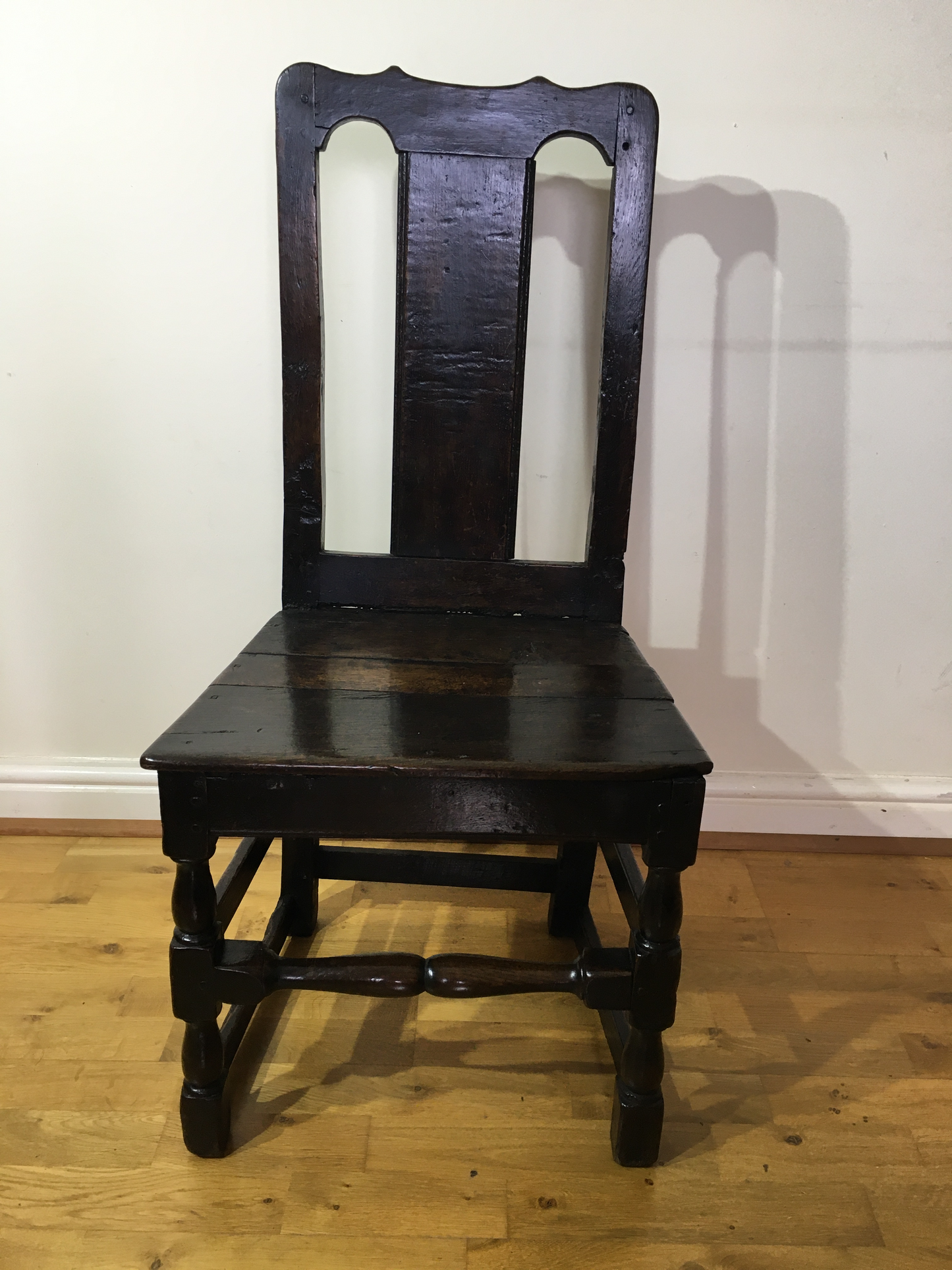 Two 17th/18th century country made chairs.