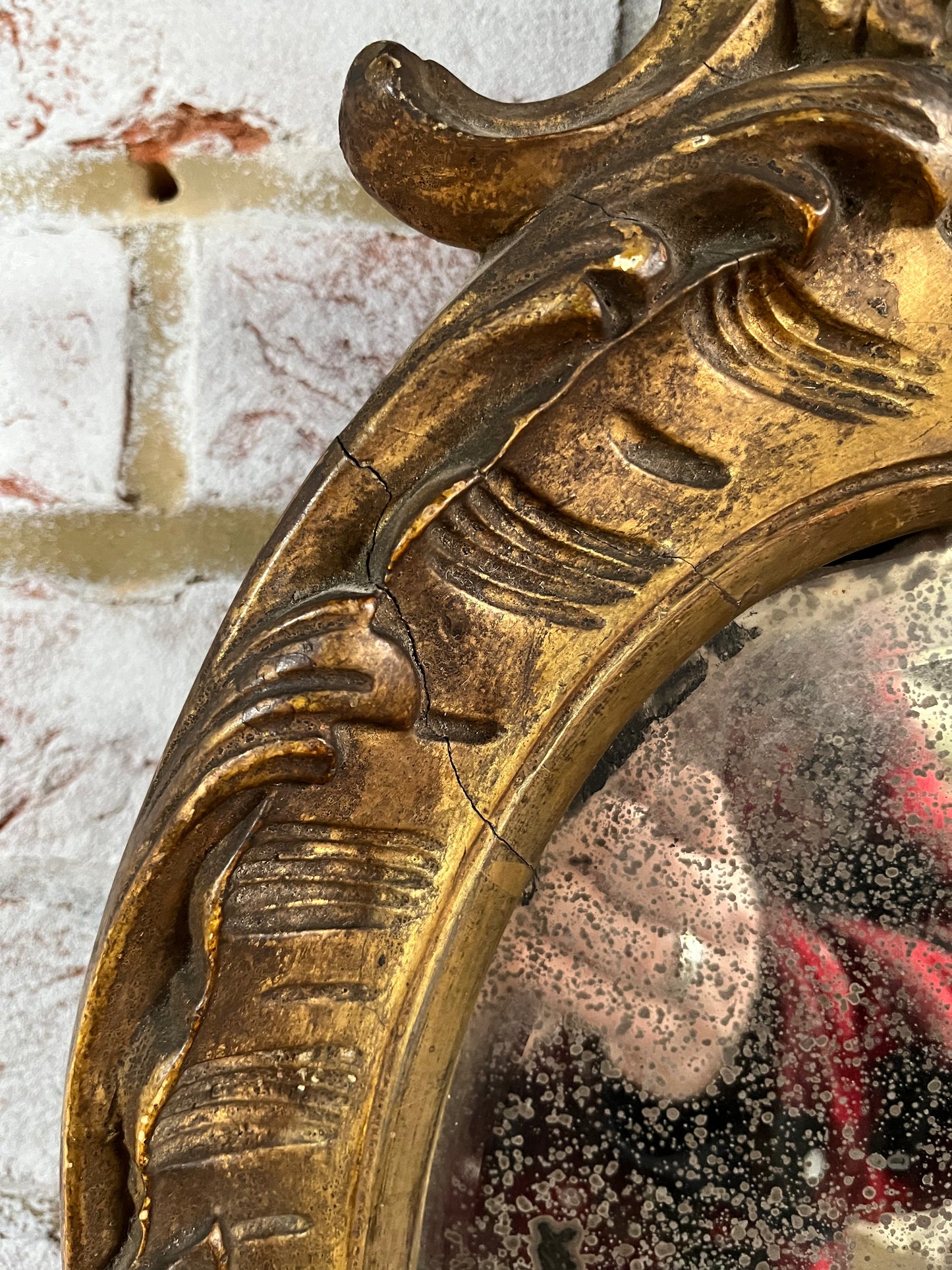 Superb rococo style mirror with foxed plate.
