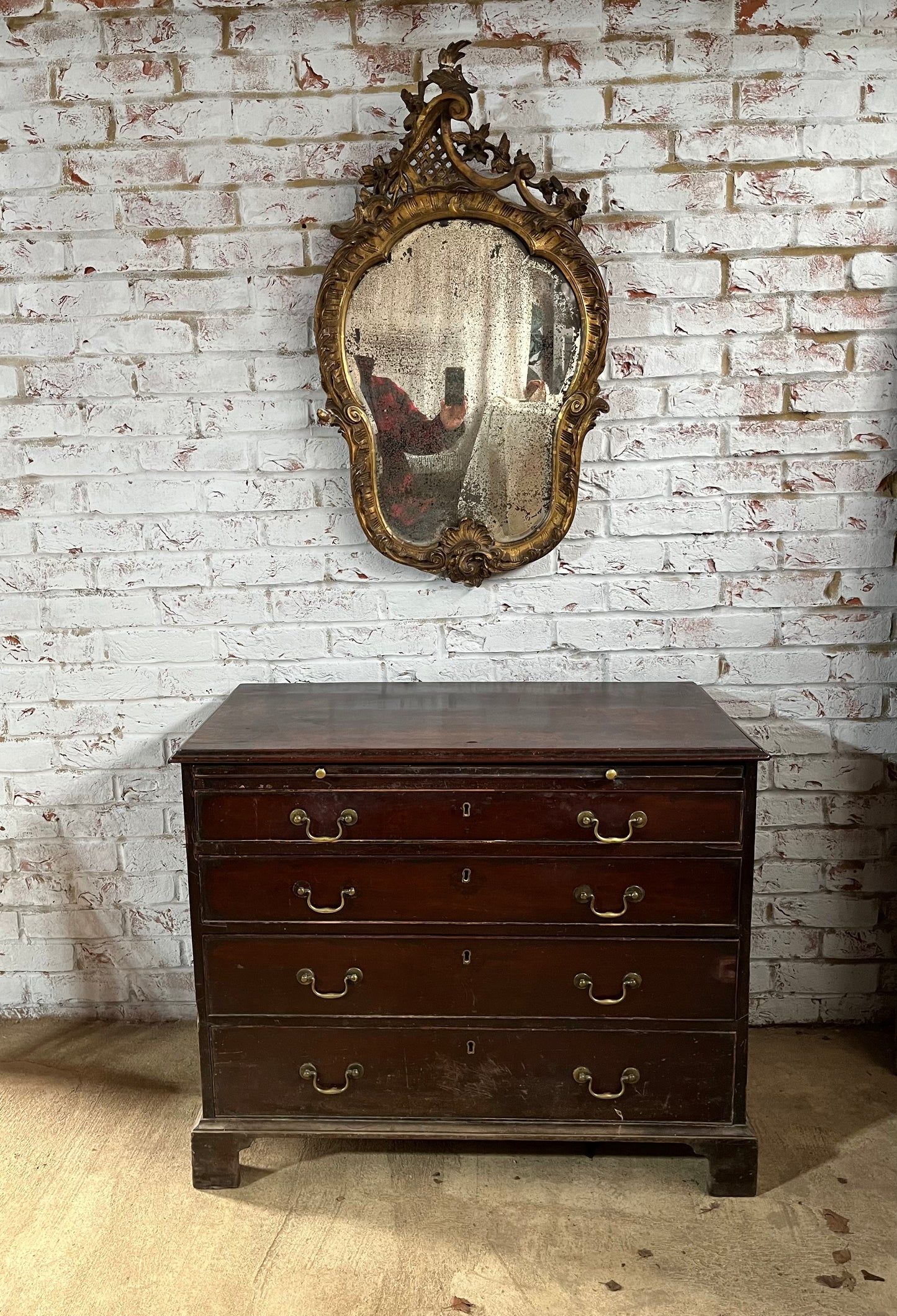 Superb rococo style mirror with foxed plate.