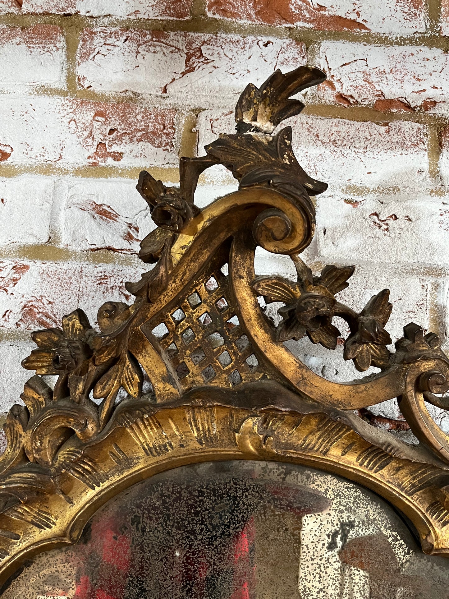 Superb rococo style mirror with foxed plate.