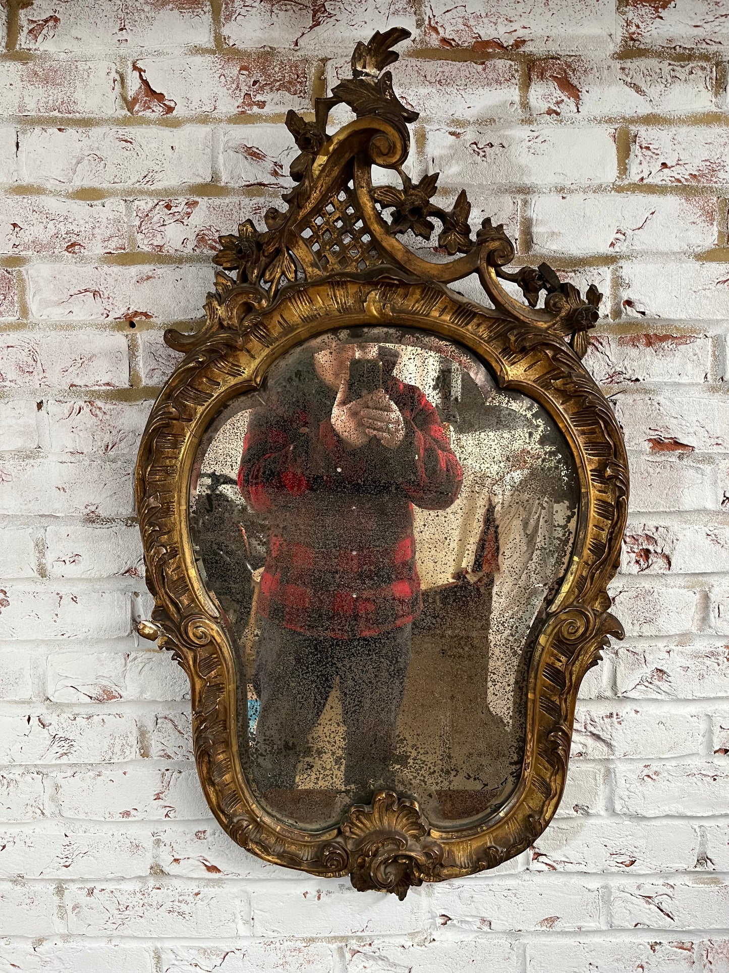 Superb rococo style mirror with foxed plate.