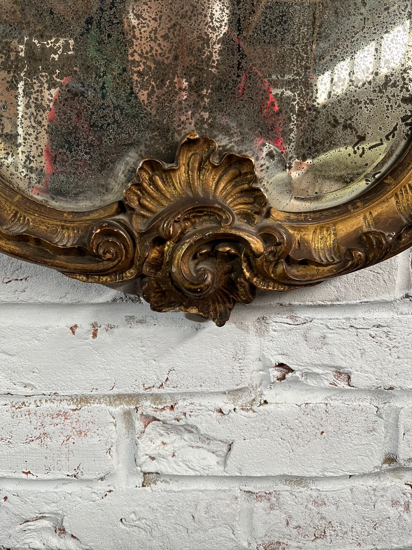Superb rococo style mirror with foxed plate.