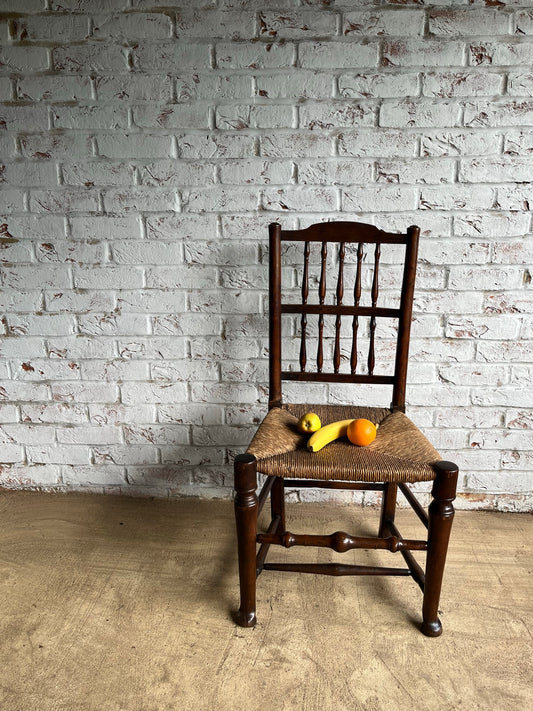 19th century spindle back chair.