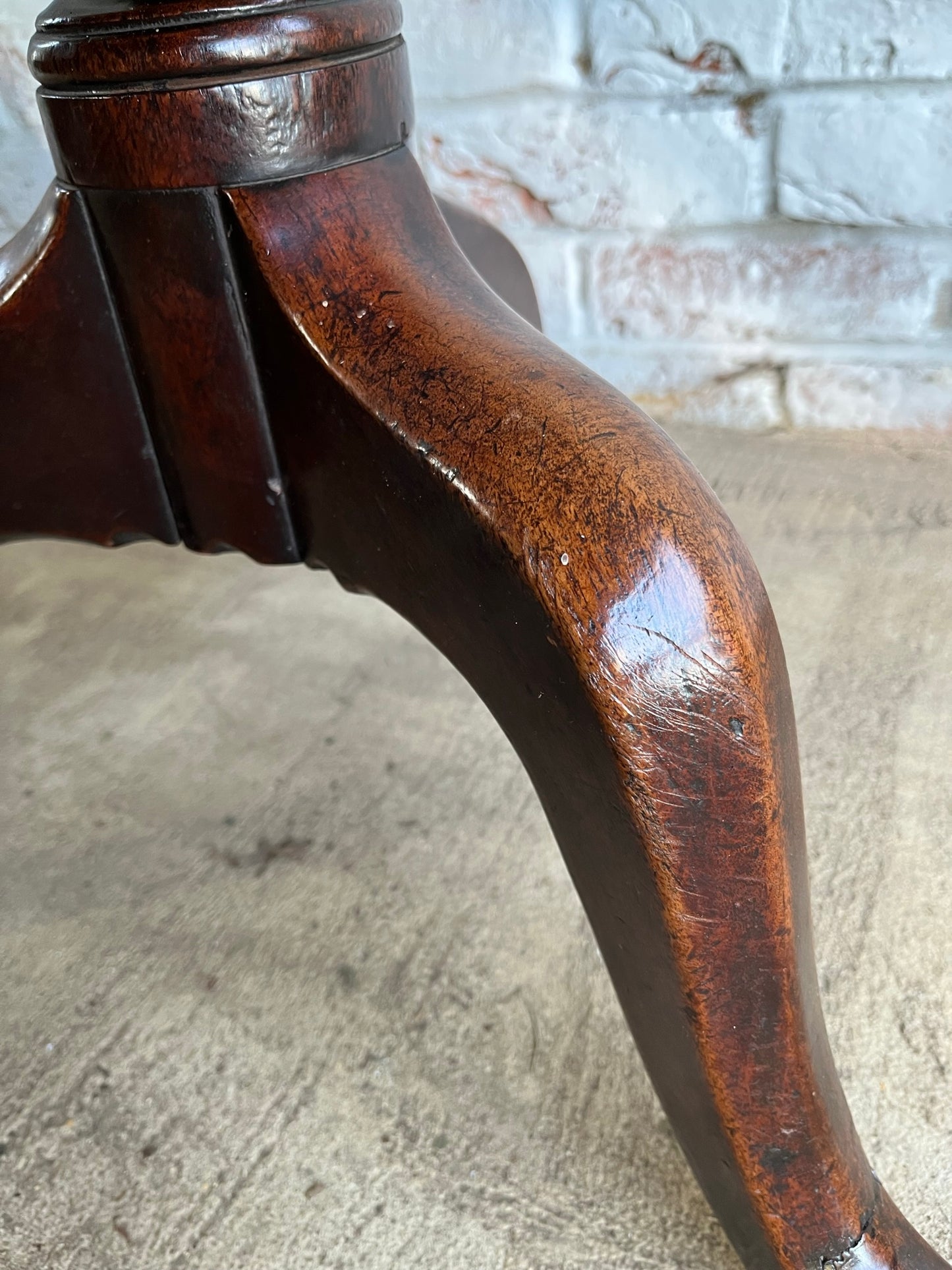 George III mahogany tilt top tripod table.
